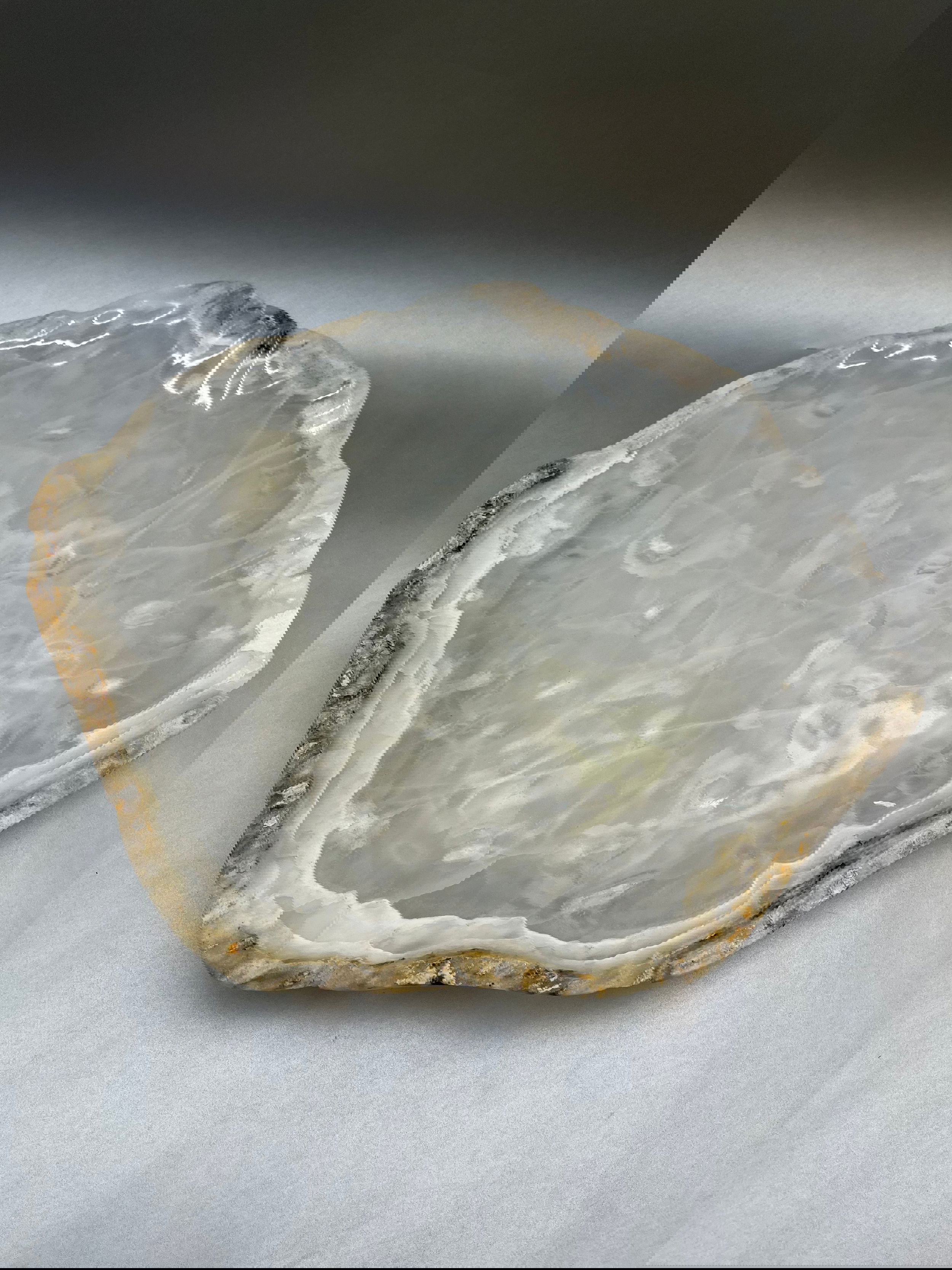 An Onyx-crafted platter of exquisite precision, the Polished Rough Edged Platter at 15" diameter reflects a blend of sophistication. Onyx Polished Rough Edged Platter
