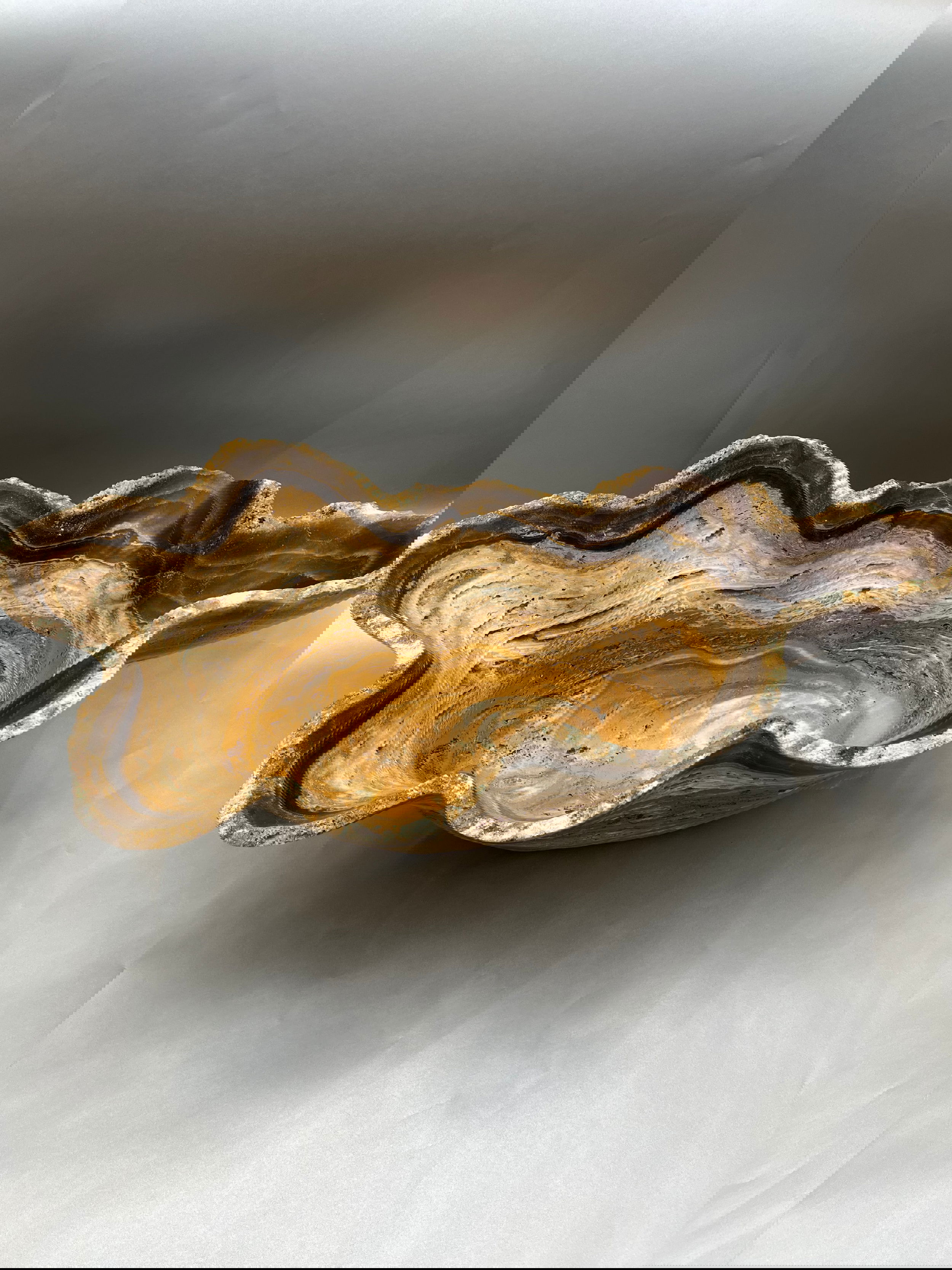 This one-of-a-kind Carved Rootbeer Onyx Freeform Bowl exudes a sophisticated charm and exquisite form that combine to offer a luxurious piece of art, form or function.14"x16" Carved Rootbeer Onyx Freeform Bowl