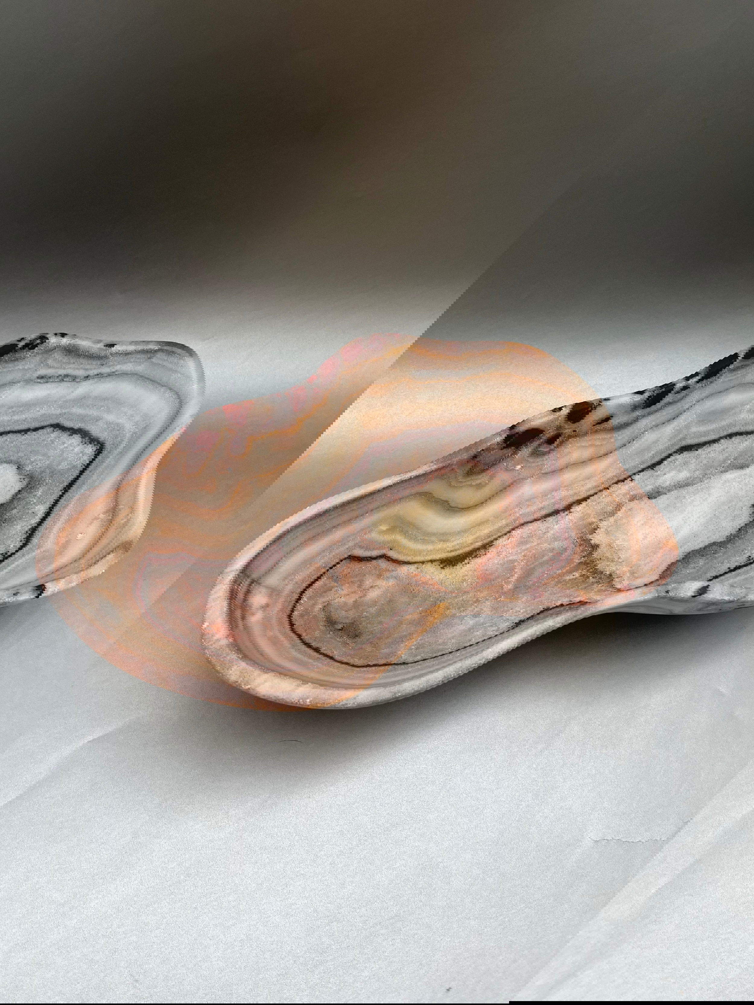 Stunning Free Form Rose Zebra Onyx Bowl measuring at 11" x 6". An elegant touch to any space. Rose Zebra Bowl