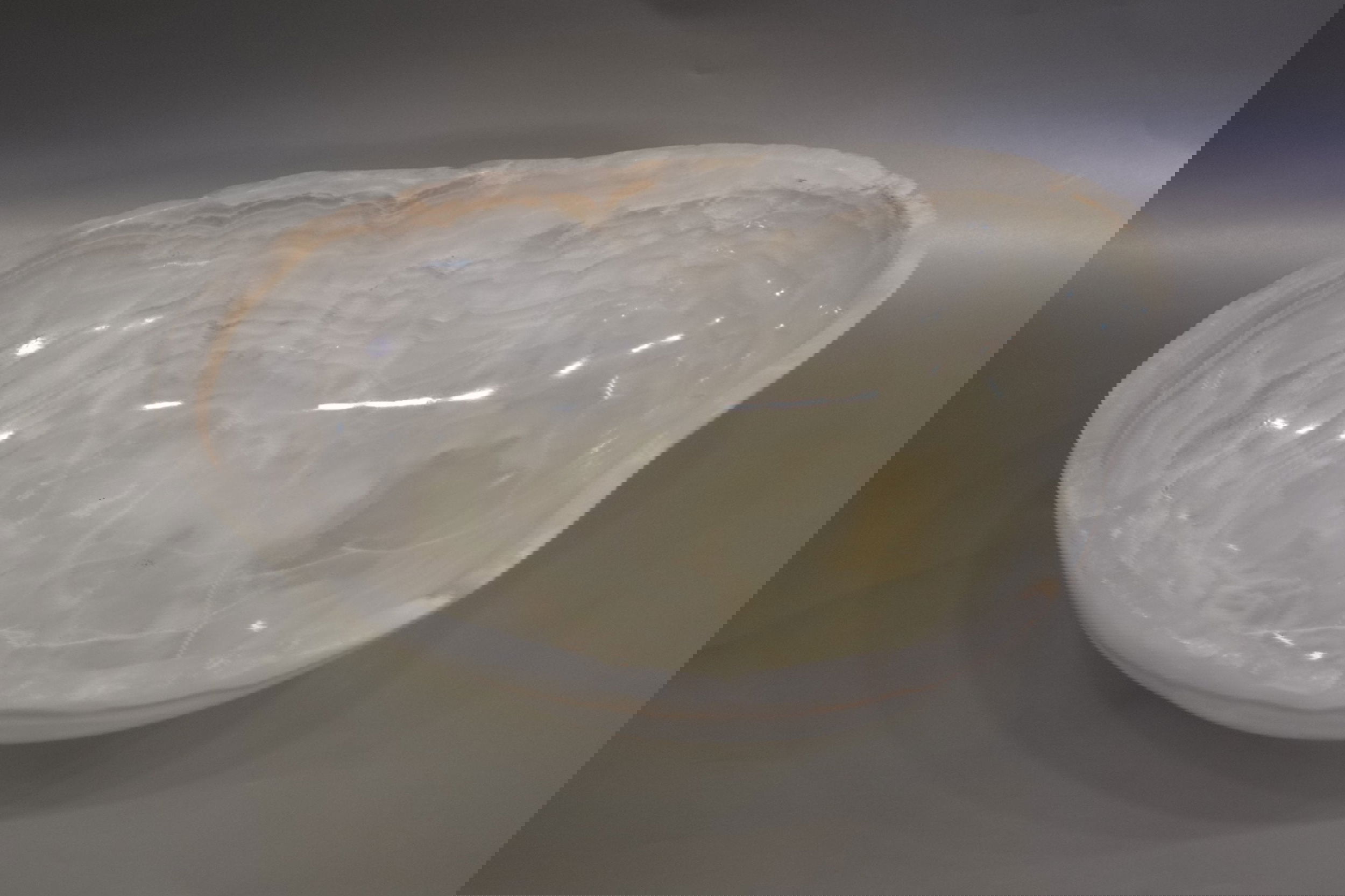 Indulge in the luxury of this exquisite Rustic Onyx Bowl. Handcrafted from the finest onyx, this bowl boasts a unique rustic banded design that exudes sophistication and charm. Perfect for adding a touch of elegance to any space, this bowl is a true statement piece that will elevate your decor.Approx. 16" x 5" Rustic Onyx Bowl