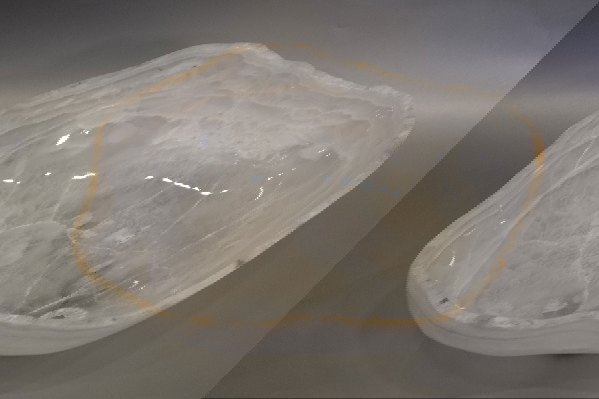 Indulge in the luxury of this exquisite Rustic Onyx Bowl. Handcrafted from the finest onyx, this bowl boasts a unique rustic banded design that exudes sophistication and charm. Perfect for adding a touch of elegance to any space, this bowl is a true statement piece that will elevate your decor.Approx. 15.5" x 4.5" Rustic Onyx Bowl