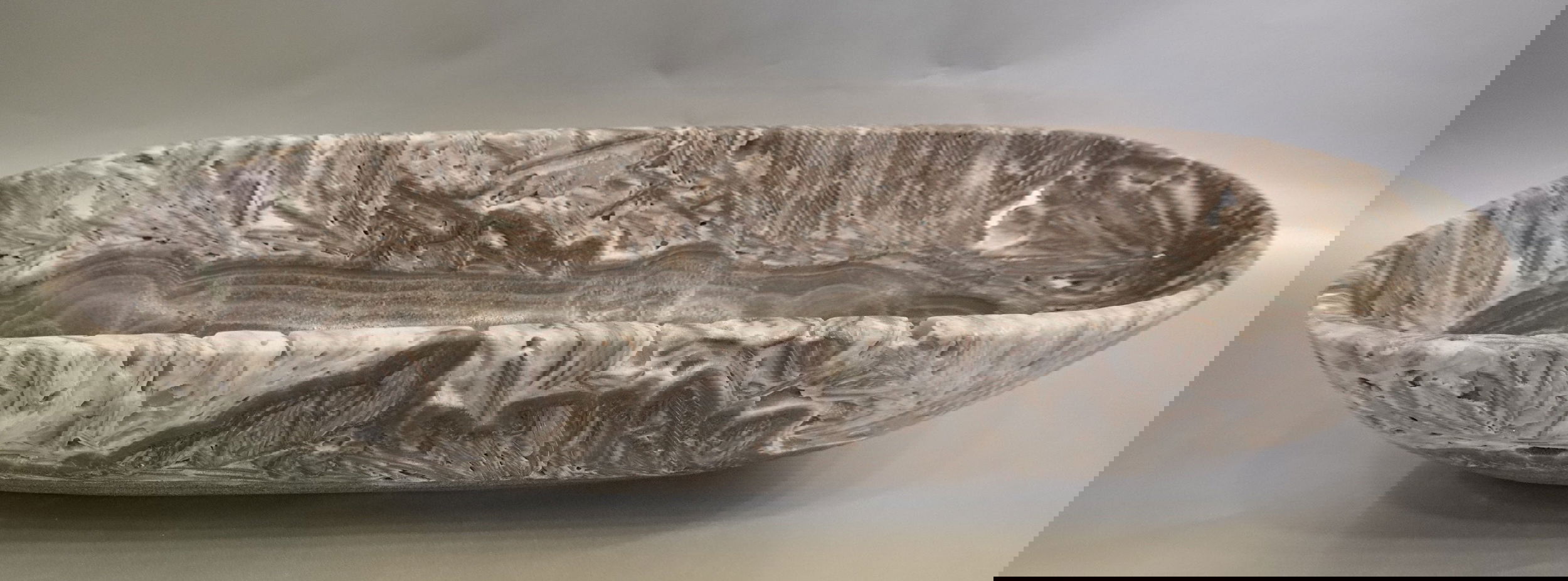 The Zebra Onyx Matte Trough is a luxurious addition to any space. Its stunning zebra onyx veining, combined with a sleek matte finish, creates a one-of-a-kind piece. This trough exudes exclusivity and elegance. Elevate your decor with this sophisticated and unique product.Approx. 26.75" x 9.25" x 5" Zebra Onyx Matte Trough