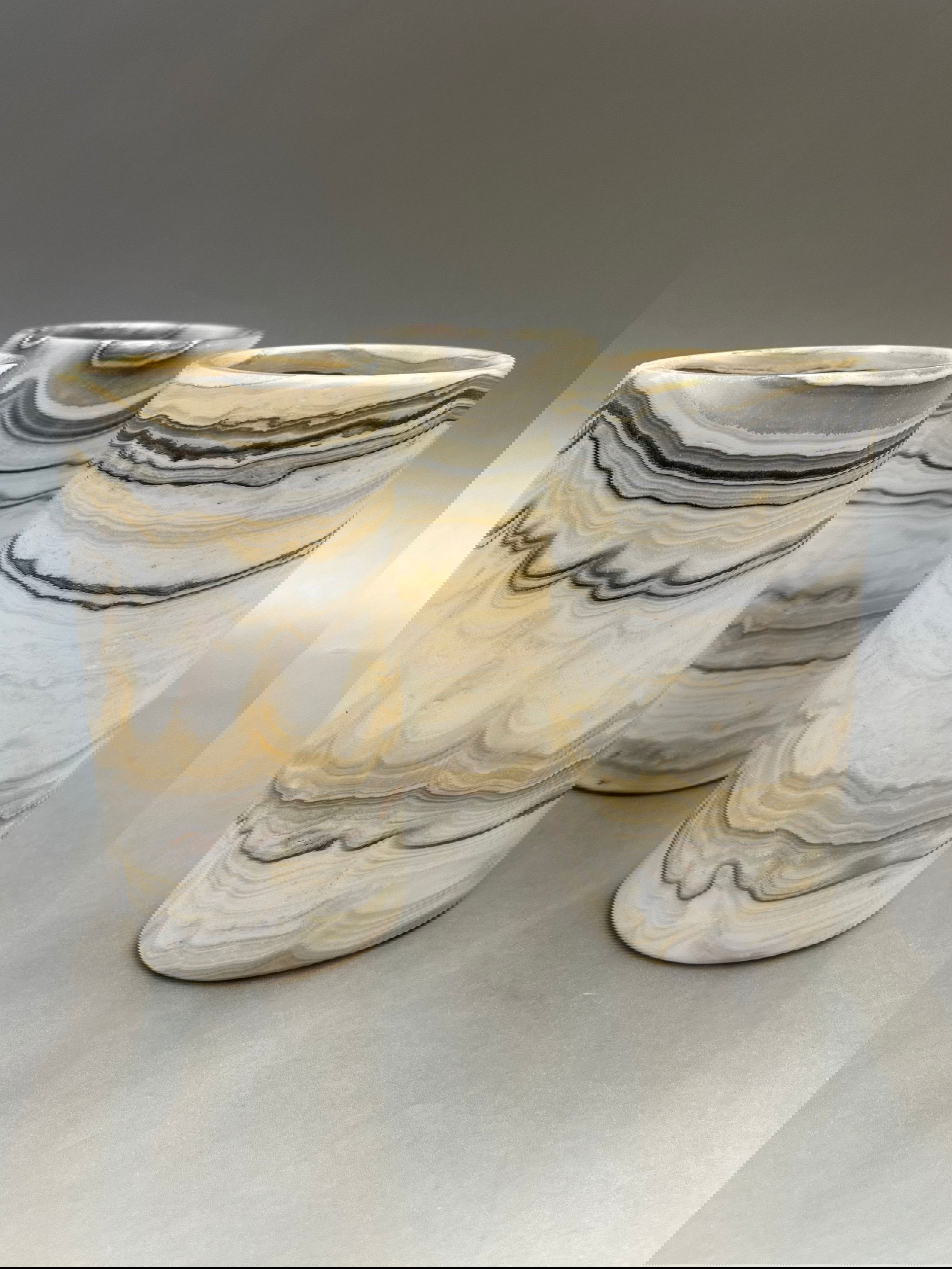 Elegantly designed in a striking, zebra-patterned onyx finish, this 5" x 2.75" tumbler/candle votive brings a sophisticated touch of opulence to any living space. Pattern will vary to each item. Zebra Onyx Tumbler/Candle Votive 13cm