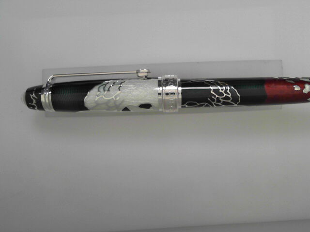 The Hans Christian Andersen Pen by David Oscarson is a limited-edition masterpiece, crafted from sterling silver and inspired by Andersen's beloved tales. With only 70 pieces available, this pen combines luxury with intricate artistry, making it a prized collectible for literature and pen enthusiasts. Elevate your writing experience with this unique blend of functionality and storytelling.-Sterling Silver-EnamelItem# 001-750-00060 Hans Christian Anderson Pen 1/70