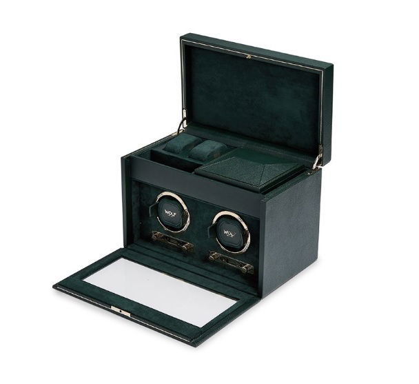 Wolf's British Racing double watch winder with storage will keep your two nicest timepieces charged up and ready to tick all day long. The stylish green leather display will make any two watches pop on a display shelf, while offering a bit of storage for papers, links, bands, etc.-Leather-Item# 001-799-01000 Double Watch Winder