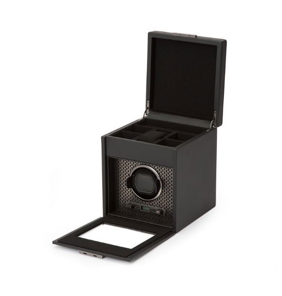 Wolf's Axis single watch winder is a must for that most special of automatic watches. The modern black leather display will keep your best timepiece charged and ready to go, while offering a bit of storage for links, bands, etc.-Leather-Item# 001-799-1003816 Single Watch Winder