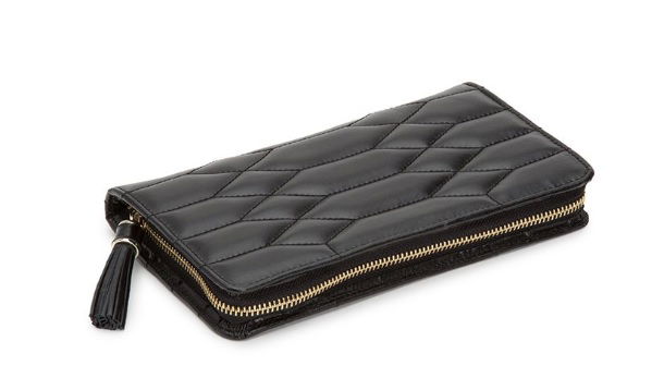 The Caroline Jewelry Portfolio in Black combines timeless elegance with practical design, keeping your jewelery secure and organized while you travel. Its classic silhouette and thoughtfully arranged interior make it the perfect companion for life on the go.-Black leather-Item# 001-760-00001 Caroline Jewelry Portfolio