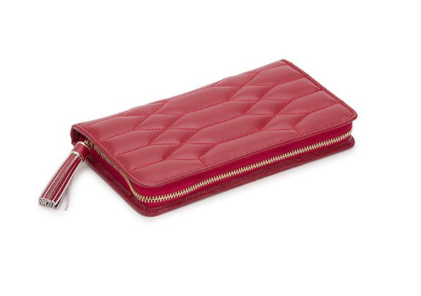 The Caroline Jewelry Portfolio in Red adds a bold touch of elegance while keeping your jewelry secure and organized on the go. With its classic design and thoughtfully arranged interior, it’s the perfect travel companion for your cherished pieces.-Leather-Item# 001-760-00003 Caroline Jewelry Portfolio