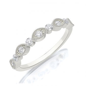 Timeless and versatile, this 18k white gold wedding band features delicate milgrain detailing, adding a touch of vintage charm. Perfect for wearing alone, as a wedding band, or stacked with other rings, its elegant design offers both brilliance and sophistication. -18k White gold-Round diamonds, 0.30cts-Size 6.5, Contact for sizing optionsItem# 110-00579 Milgrain Wedding Band