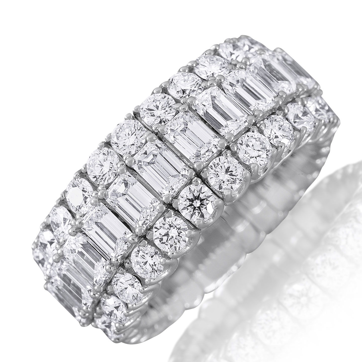 What better way to celebrate an anniversary than with a stunning diamond ring from Picchiotti? Featuring emerald and round-cut diamonds set in 18k white gold, this piece combines beauty and comfort. Picchiotti's Xpandable line ensures a flexible fit without sacrificing its luxurious style and elegance.-18k White gold-Emerald Diamonds, 3.98cts-Round diamonds, 2.94cts-Expandable Size, Contact for sizing optionsItem# 120-00160 Xpandable Eternity Band