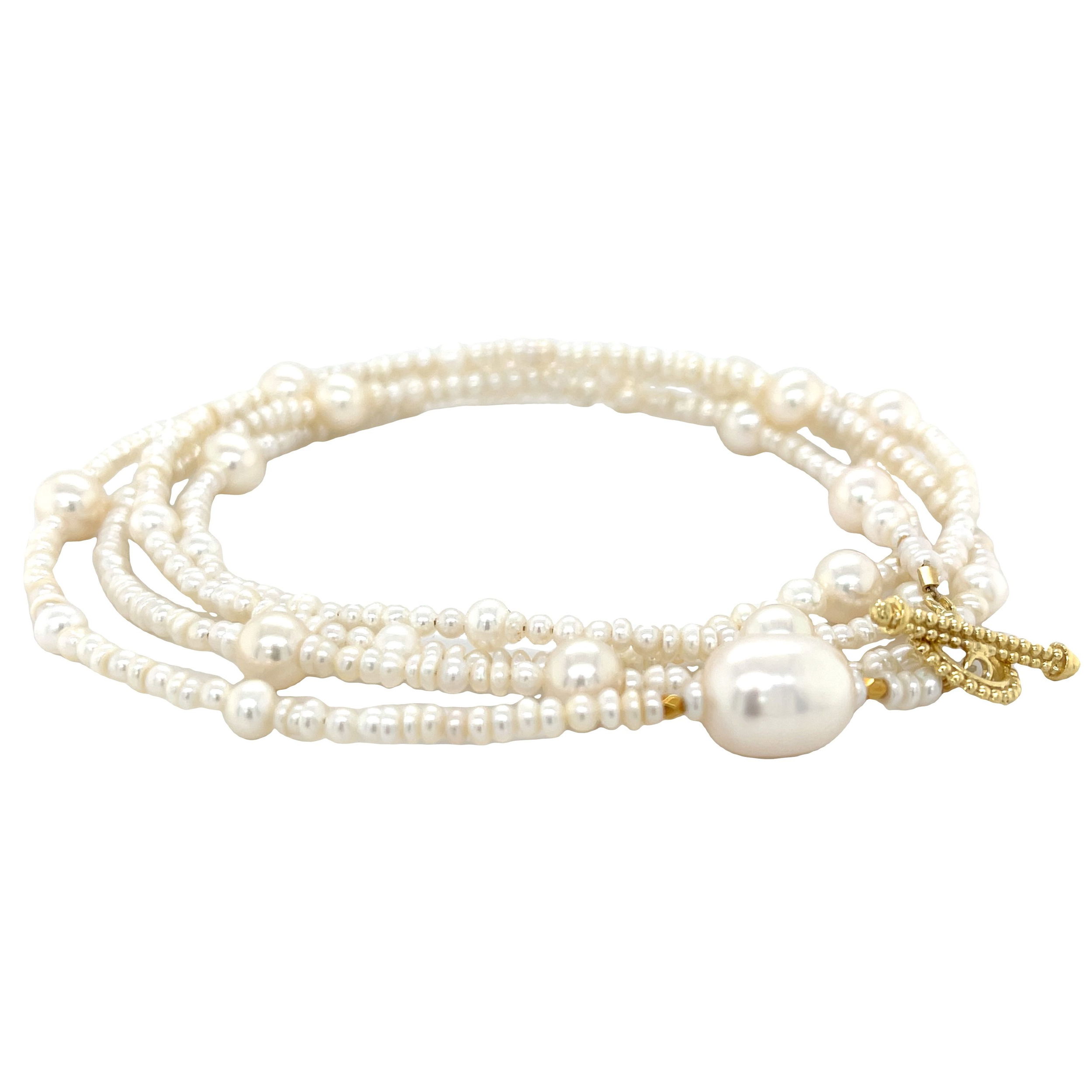 Elegant white pearls and 18k yellow gold make this wrap bracelet a standout accessory. It's designed to complement any outfit and transform into a long or layered necklace for versatility. Available in additional sizes and materials. Contact us to explore your options. -18k yellow gold-White pearls-Length 34"Item# 330-00057 Convertible Wrap Bracelet | White Pearls