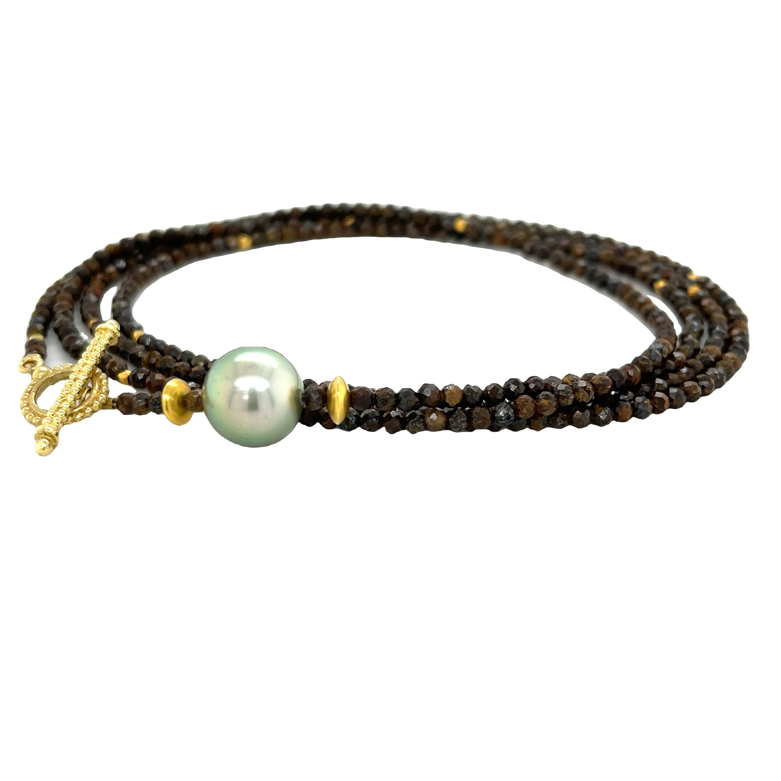 This Tigers Eye convertible wrap bracelet features 18k yellow gold and a stunning Tahitian pearl, creating a stylish and sophisticated look. Perfect for any occasion, it's also able to transform into a long or layered necklace. Pair with an Empress Pendant for added styling options.-18k Yellow gold-Tahitian pearl-Length 36"Item# 808-00877 Tigers Eye and Tahitian Pearl Convertible Wrap Bracelet 36"