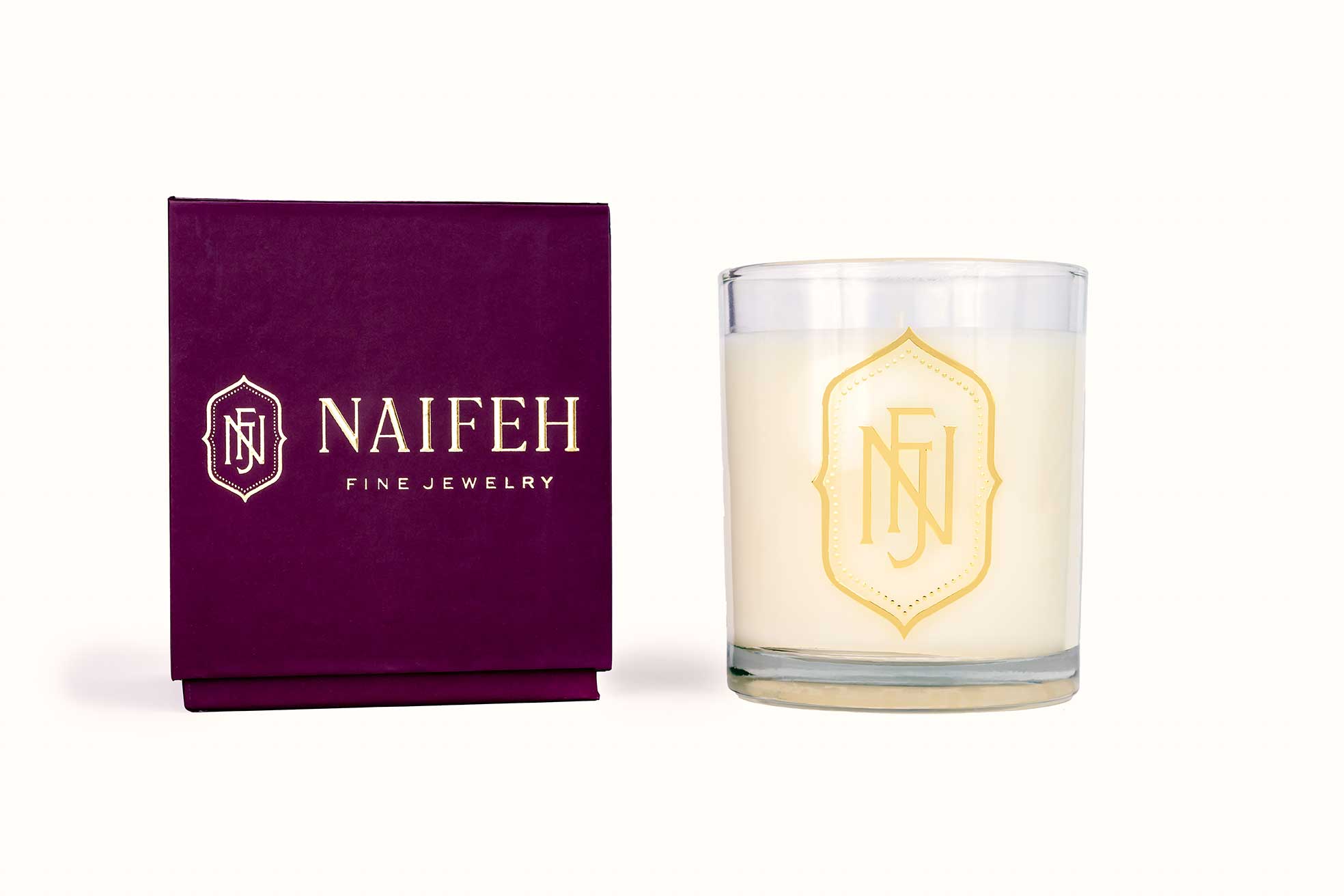 Enliven your space with the Naifeh Fine Jewelry signature scent. Not overly feminine, our candles and room sprays inspire an air of mystery and serenity with top notes of Black pepper and Bergamot and middle notes of Cardamom, Iris and Lily of the Valley Innocence Candle