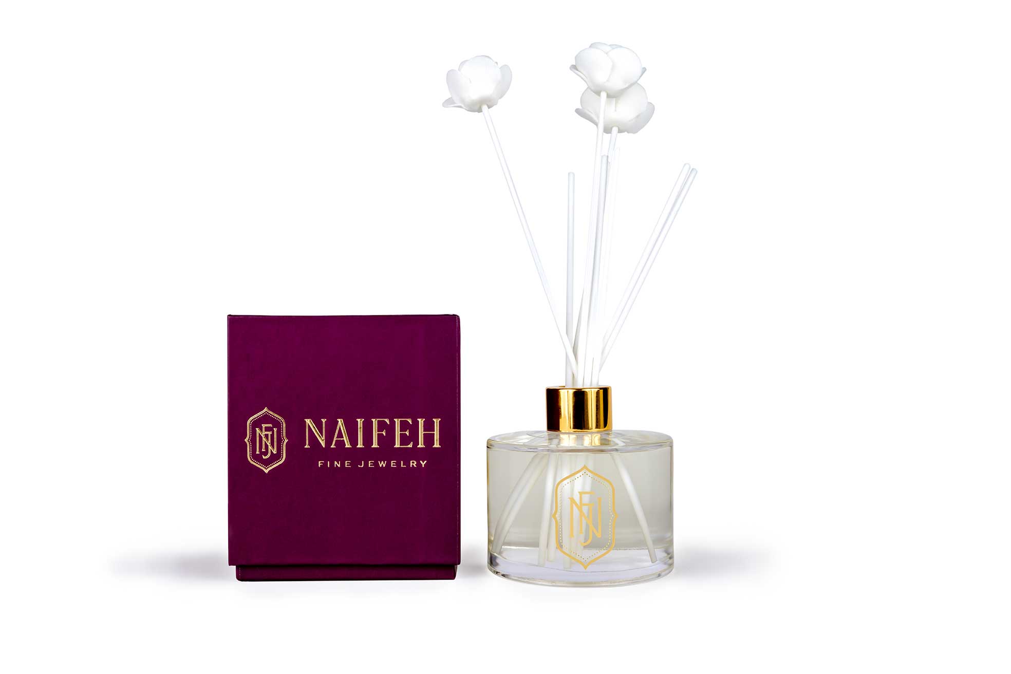 Enliven your space with the Naifeh Fine Jewelry signature scent. Not overly feminine, our candles and room sprays inspire an air of mystery and serenity with top notes of Black pepper and Bergamot and middle notes of Cardamom, Iris and Lily of the Valley Naifeh Fragrance Reed Diffuser