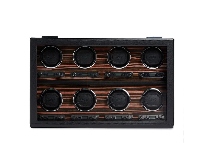 Wolf's Roadster 8 piece watch winder is the ultimate must for a serious watch enthusiast. The modern black leather and wood presentation displays eight different watches, keeping them wound and ready for action. -Leather-Wood-Item# 001-799-01302 8 Piece Watch Winder