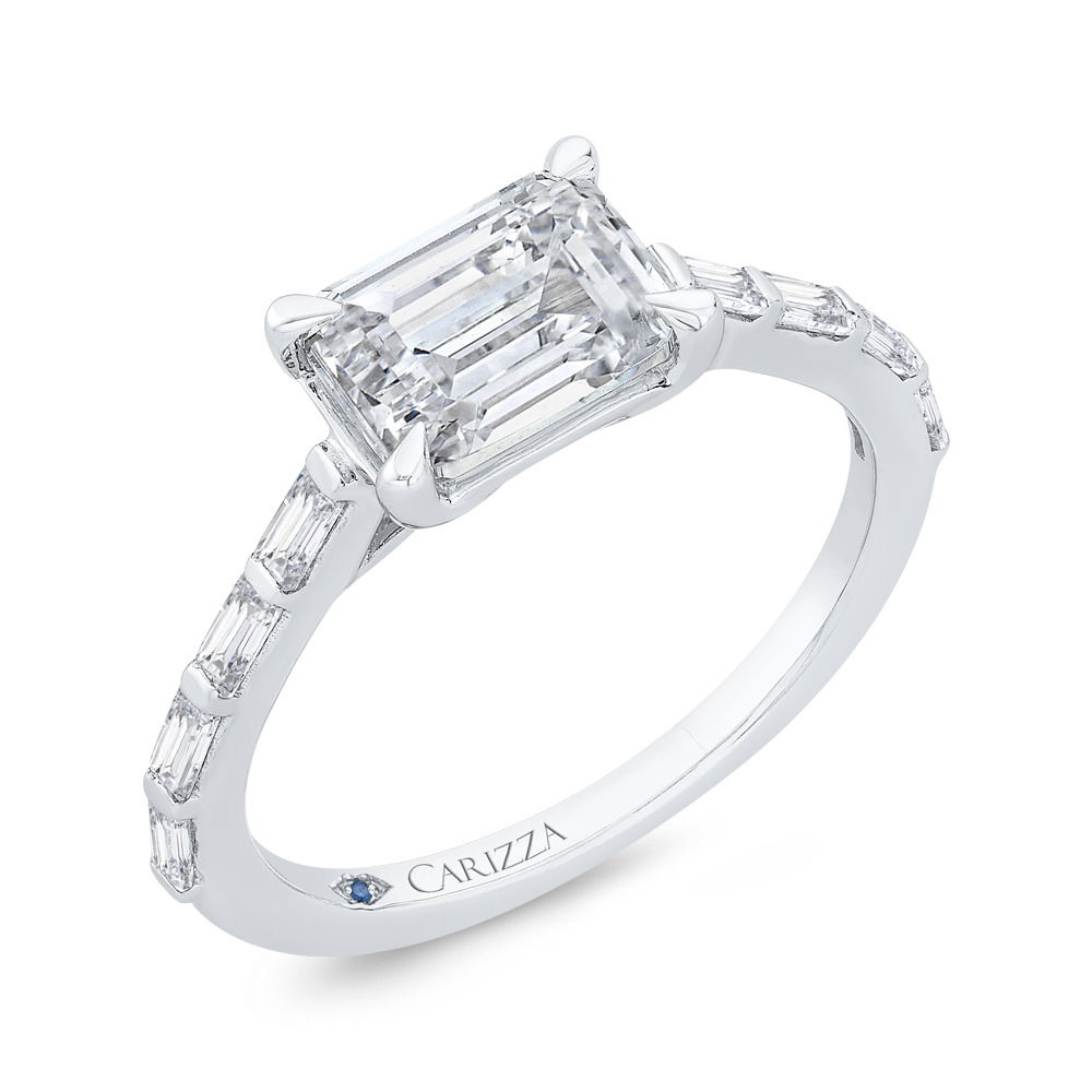This modern 14k White gold semi-mount is designed for an east-to-west set center stone, offering a unique and contemporary look. Bar-set baguette diamonds on the shank add sleek, sophisticated sparkle, creating a refined yet eye-catching design. (Center stone not included)-14k White gold-Baguette diamonds, 0.32cts-Size 6.5, Contact for sizing optionsItem# 140-00199 East West Mounting