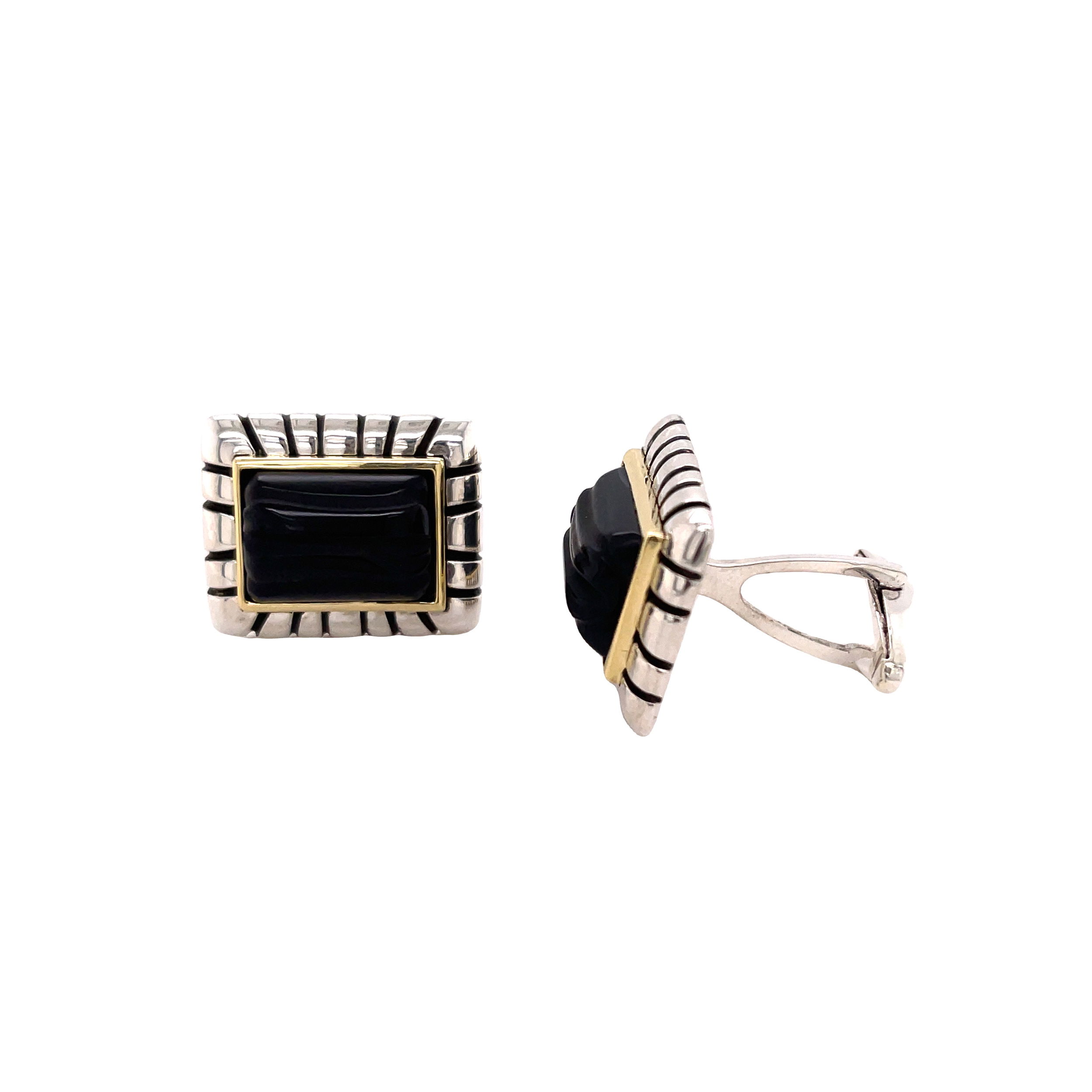 These carved onyx cufflinks make a bold statement, with 18k yellow gold and sterling silver for a sleek, refined look. Perfect for elevating any suit, they add a touch of sophistication with their rich contrast and timeless design.-18k Yellow gold-Sterling silverItem# 002-800-00291 Carved Onyx Cufflink
