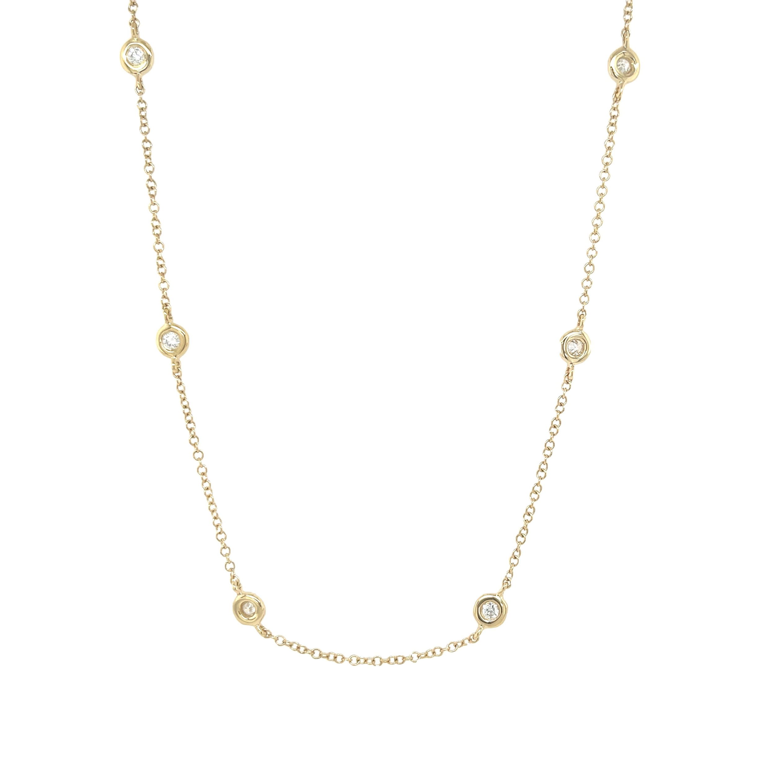 Elevate your elegance with the diamonds-by-the-yard necklace, an exquisite showcase of timeless beauty and modern sophistication. All Shy Creation diamonds are natural and hand-selected. All stones are unique and hand set. As a result, you can expect slight variations in the shade, hue, tint of the color stones and stone count.-14k Yellow gold-Round diamonds, 0.28cts-Dimensions, 10 stones-Chain length, 15"-18"Item# 807-01145 Diamonds By The Yard Necklace
