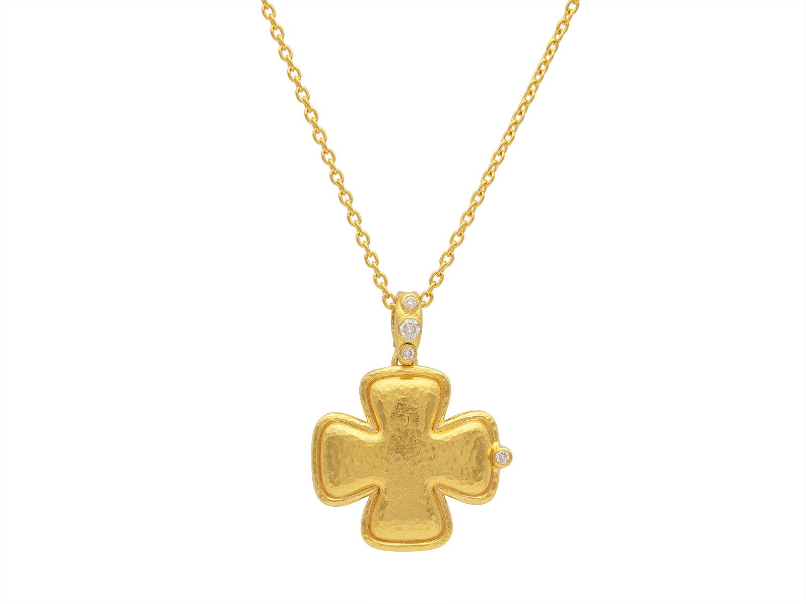 This cross pendant, crafted in 24k yellow gold and adorned with diamonds, offers a radiant blend of elegance and meaning. Its timeless design makes it a cherished piece for any occasion.-24k Yellow gold-Round diamonds, 0.20ctsItem# 001-806-00320 Cross Pendant
