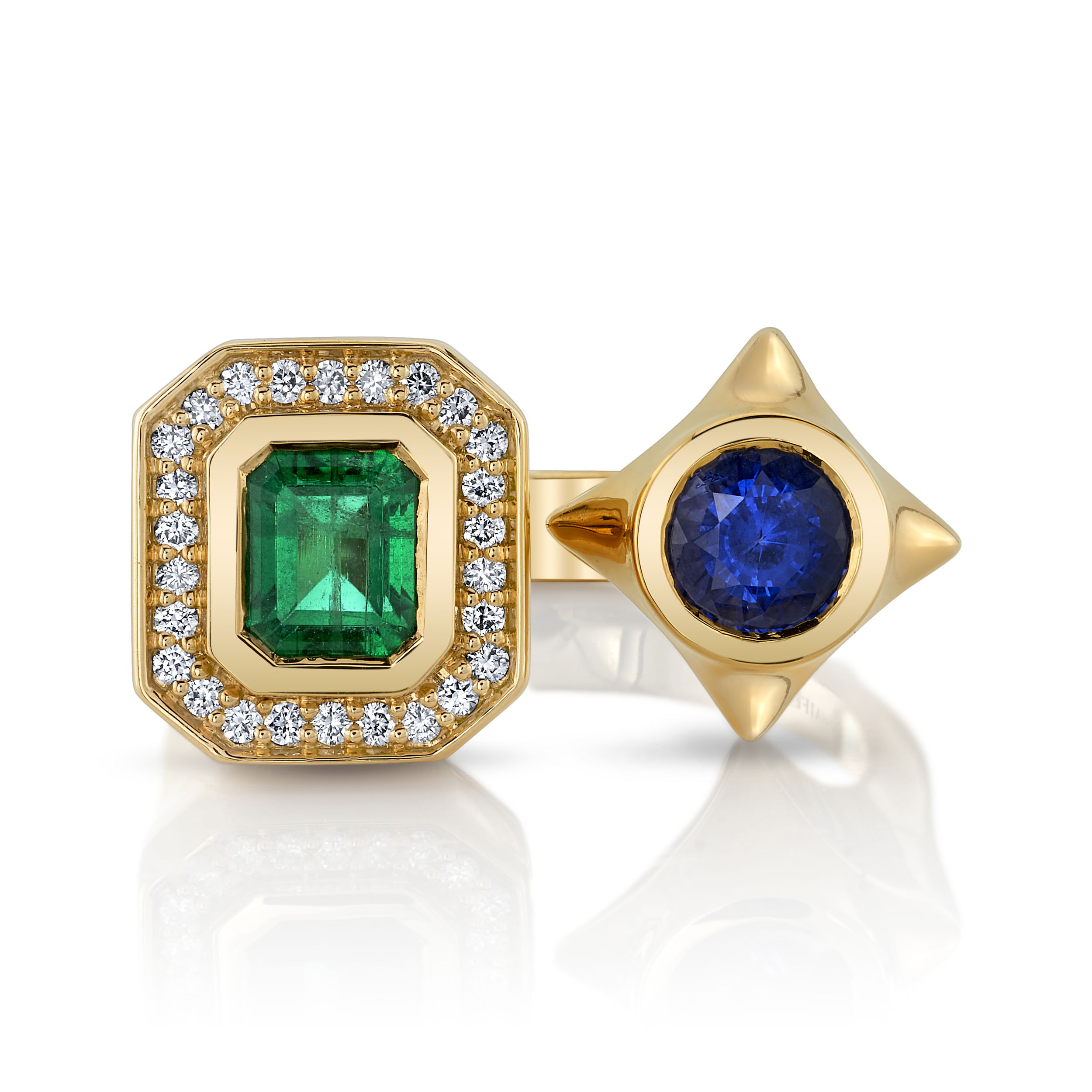 This 18k yellow gold ring features a stunning combination of emerald, sapphire, and diamonds, creating a vibrant and luxurious design. The bold mix of gemstones brings a perfect balance of color and sparkle, making it a standout piece for any occasion.-18k Yellow gold-Emerald, 0.83cts-Sapphire, 0.81cts-Diamonds, 0.13ctsItem# 804-00413 POW Emerald x Sapphire Power Ring