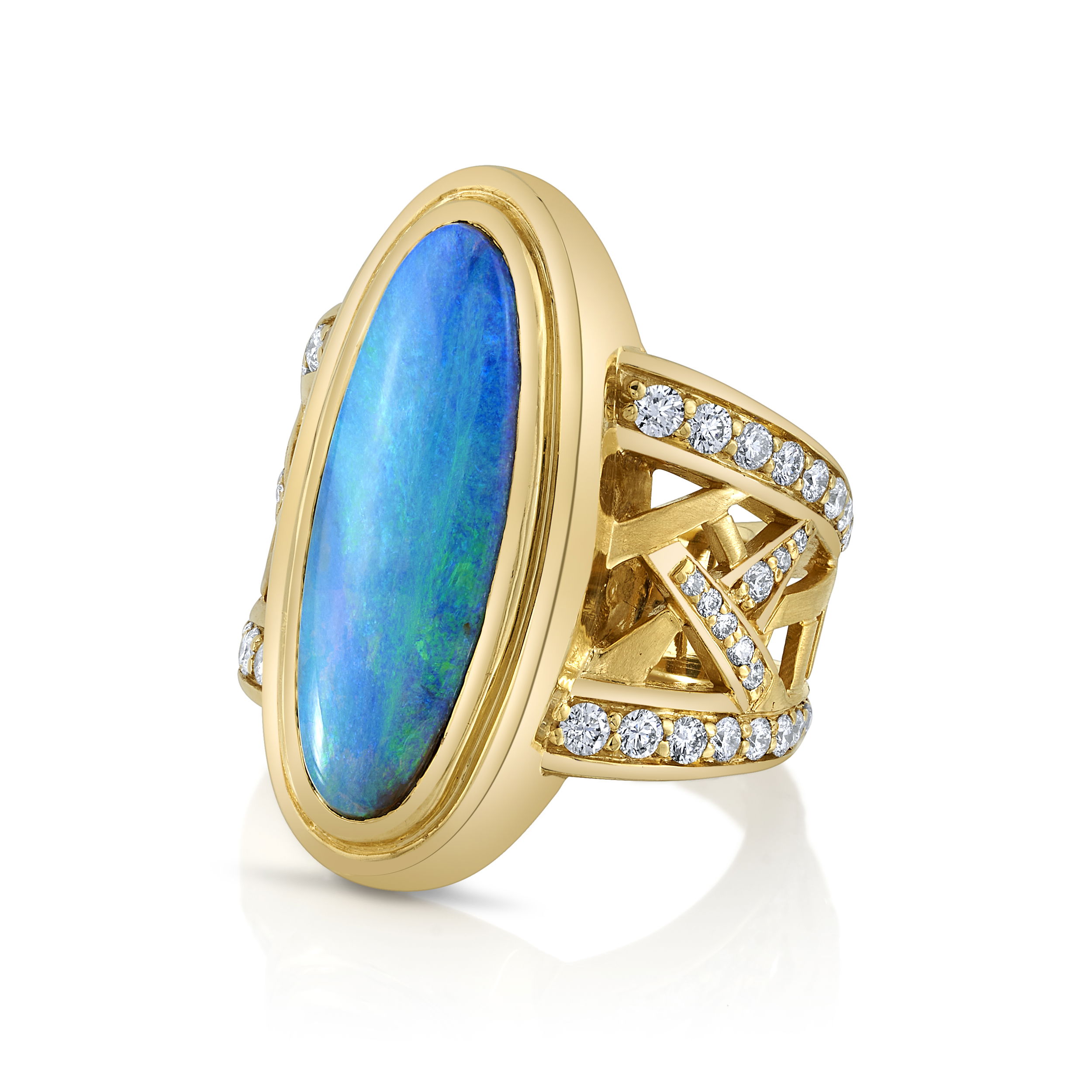 The Luster Ring features a mesmerizing opal at its center, accented by sparkling round diamonds and set in 18k yellow gold. A blend of vibrant color and timeless brilliance, it adds a touch of refined luxury to any occasion.-18k Yellow gold-Oval boulder opal-Round diamonds, 0.85cts-Size 7. Contact for sizing options.Item# 200-01083 Luster Ring
