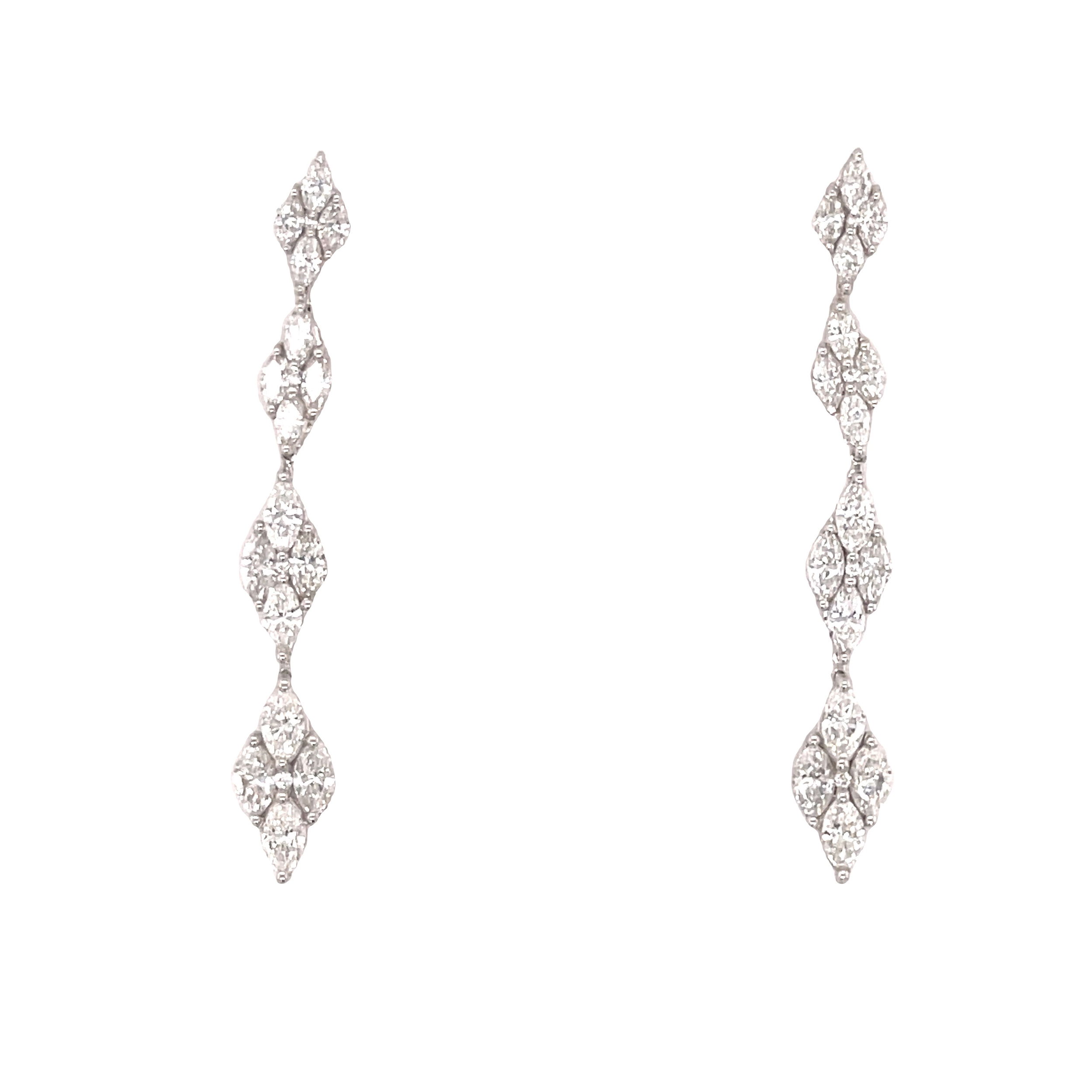 Elevate your elegance with these stunning diamond drop earrings. Designed to capture light from every angle, the graceful marquise diamonds create a shimmering, elongated silhouette that exudes sophistication. Perfect for special occasions or adding a touch of luxury to your everyday style.-18k White gold-Marquise Diamonds, 3.08cts-Round Diamonds, 0.04ctsItem# 150-01625 Diamond Drop Earrings
