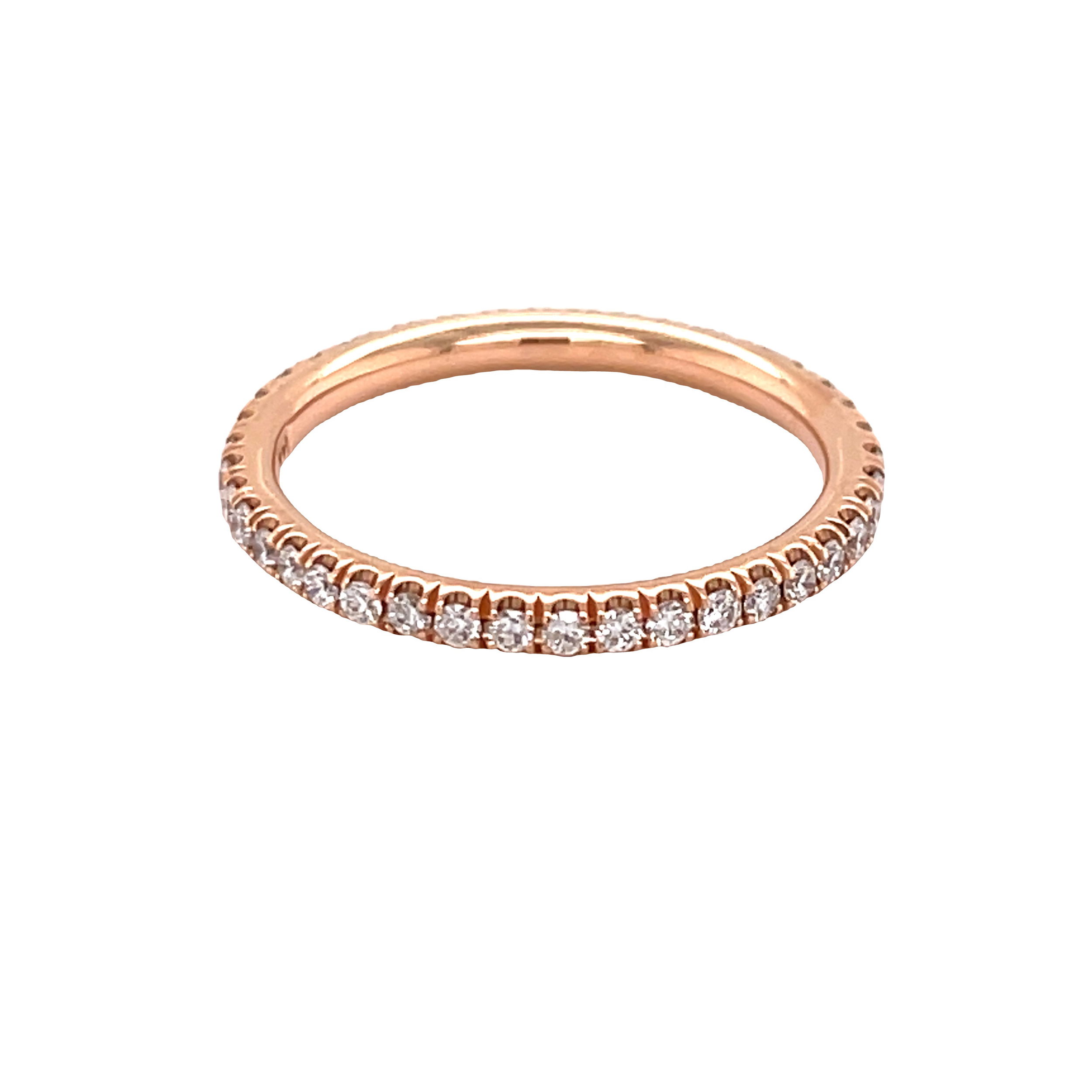 This 18k rose gold eternity band is meticulously crafted with micro-pave set round diamonds, offering continuous sparkle and elegance. Its timeless design makes it the perfect symbol of everlasting love, adding a touch of luxury to any jewelry collection.-18k Rose gold-Round diamonds, 0.47cts-Size 6.5, Contact for sizing optionsItem # 120-00096 Diamond Eternity Band
