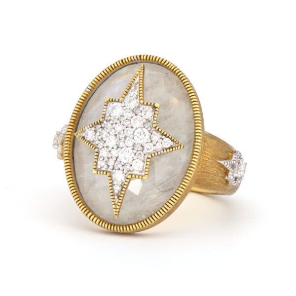 Combining classic elegance with on trend shapes and styles, JFJ offers something for women of all ages. From the Moroccan Collection, this piece features pave diamonds in a center star design, set in 18k yellow gold. Designed to stand out, this ring allows itself to be a beautiful statement piece.-18k Yellow gold-Round white diamonds, 0.35cts-Moonstone-Dimensions, 20mm-Size, 7Item# 804-2000016 Large Stone Pave Diamond Starburst Cocktail Ring