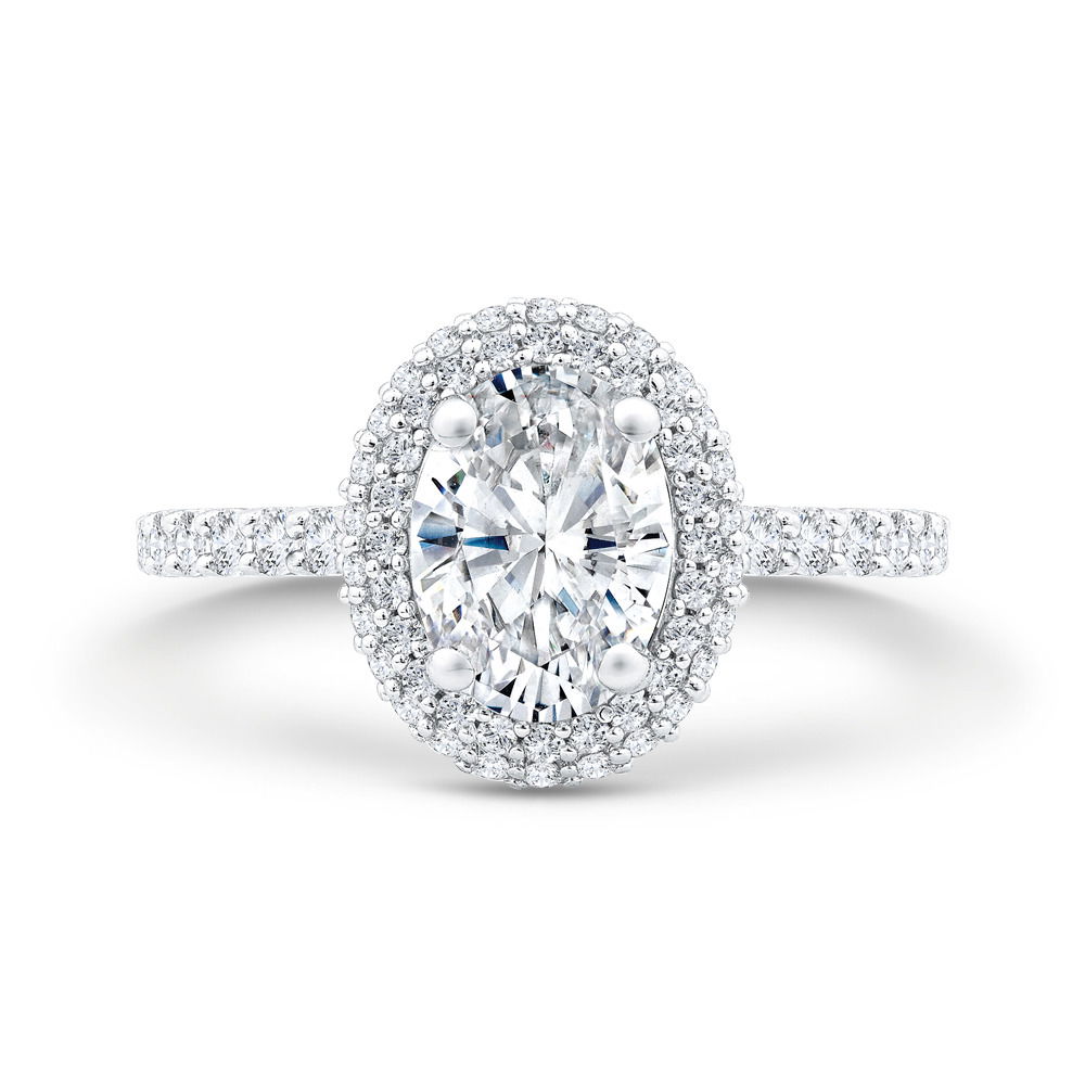 This breathtaking 14k White gold semi-mount features a domed halo, designed to enhance the brilliance of your chosen center stone. The elevated halo creates a luminous, dimensional effect, adding extra sparkle from every angle. A timeless and sophisticated setting, perfect for those who love a bold yet classic look. (Center stone not included)-14k White gold-Round diamonds, 0.62cts-Size 6.5, Contact for sizing details Item# 140-00198 Oval Halo Mounting