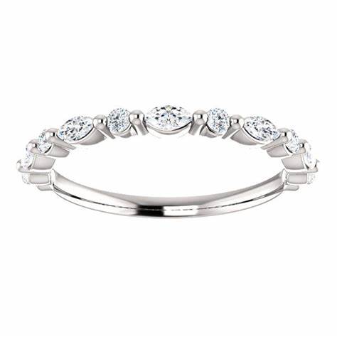 Crafted in 14K white gold, this wedding band features alternating round and marquise diamonds set in shared prongs for a delicate, continuous sparkle. A timeless design with graceful symmetry and romantic charm.-14k White gold-Round, Marquise diamonds, 0.37cts-Size 6.5, Contact for sizing optionsItem# 110-00569 Scalloped Wedding Band