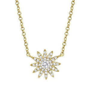 Bring sunshine to cloudiest of days with this dainty sunburst pendant composed of gold and diamonds. Compliment your look with matching earring studs or other layered necklaces. -14k Yellow gold-Sunburst design-Various size round diamonds, 0.15cts-Length 15", 16", 17", 18" on adjustable chainItem# 807-01062 Sunburst Diamond Necklace