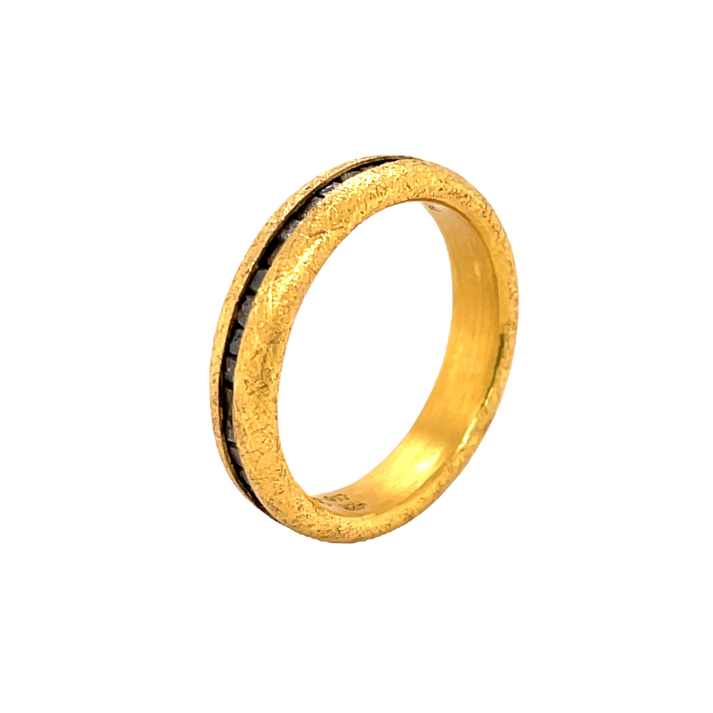 Crafted in rich 22 karat yellow gold, this eternity band showcases a continuous row of raw diamonds for a bold, organic look. The natural texture of the stones paired with the warmth of the gold creates a striking balance of elegance and edge.-22k Yellow gold-Cubed raw diamonds, 2.00cts-5mm-Size 10.5, Contact for sizing optionsItem# 115-00004 Raw Diamond Men's Eternity Band