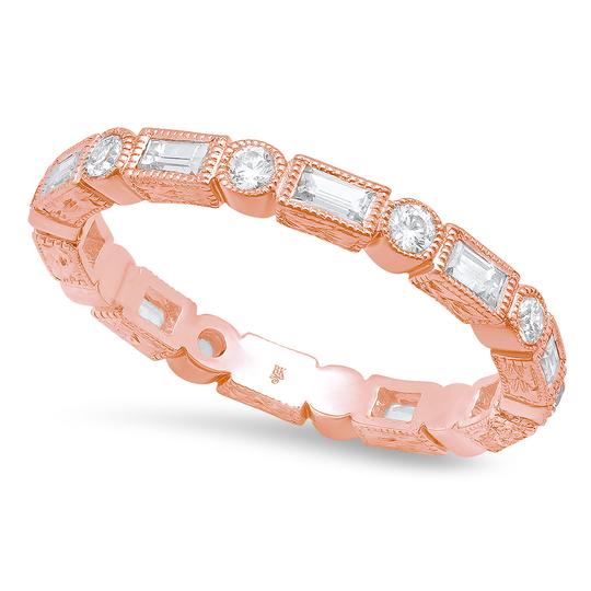 Inspired by timeless design, this vintage-style eternity band in 18k rose gold features alternating round and baguette diamonds for a look that’s both elegant and enduring. A graceful tribute to everlasting love with a hint of old-world glamour.-18k Rose gold-Round, Baguette diamonds, 0.31cts-Size 6.5, Contact for sizing optionsItem# 120-00006 Vintage Eternity Band