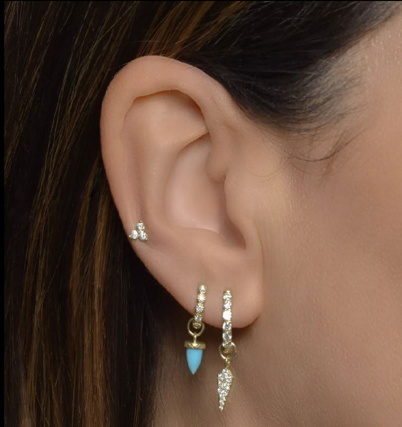 Combining classic elegance with on trend shapes and styles, JFJ offers something for women of all ages. From the Petites Collection, this charm features pave set white diamonds set in 18K yellow gold. Hoops and earring charms sold separately. Charms sold as singles.-18k Yellow gold-Round white diamonds, 0.11cts-Dimensions, 10mmItem# 811-00210 Petite Diamond Dagger Earring Charm