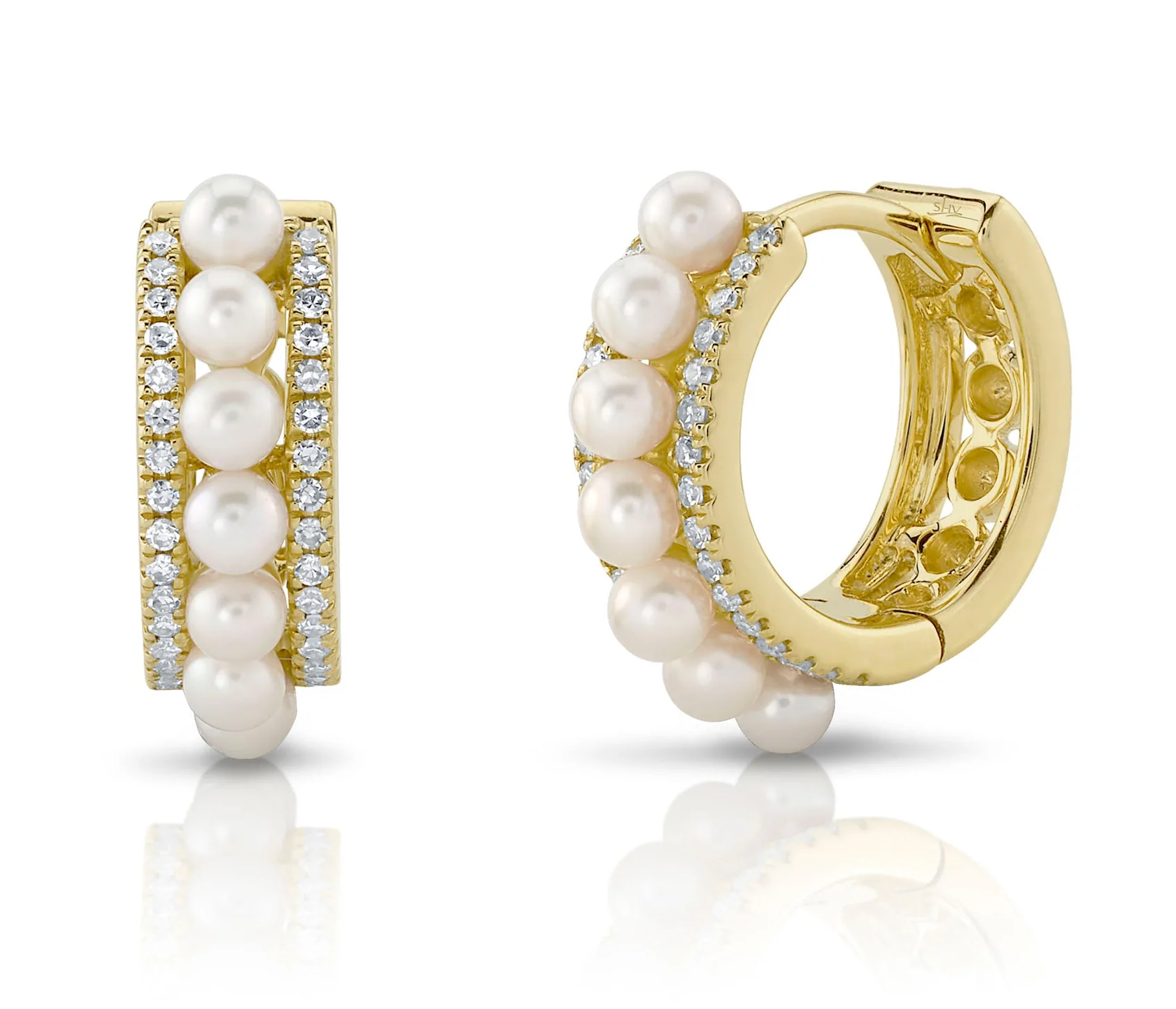 Elegant and timeless, these small hoops are crafted in 14k yellow gold and accented with pearls for a classic touch. Sparkling diamonds add just the right amount of brilliance.-14k Yellow gold-Round pearls-Round diamonds, 0.15ctsItem# 805-01810 Small Pearl Hoops