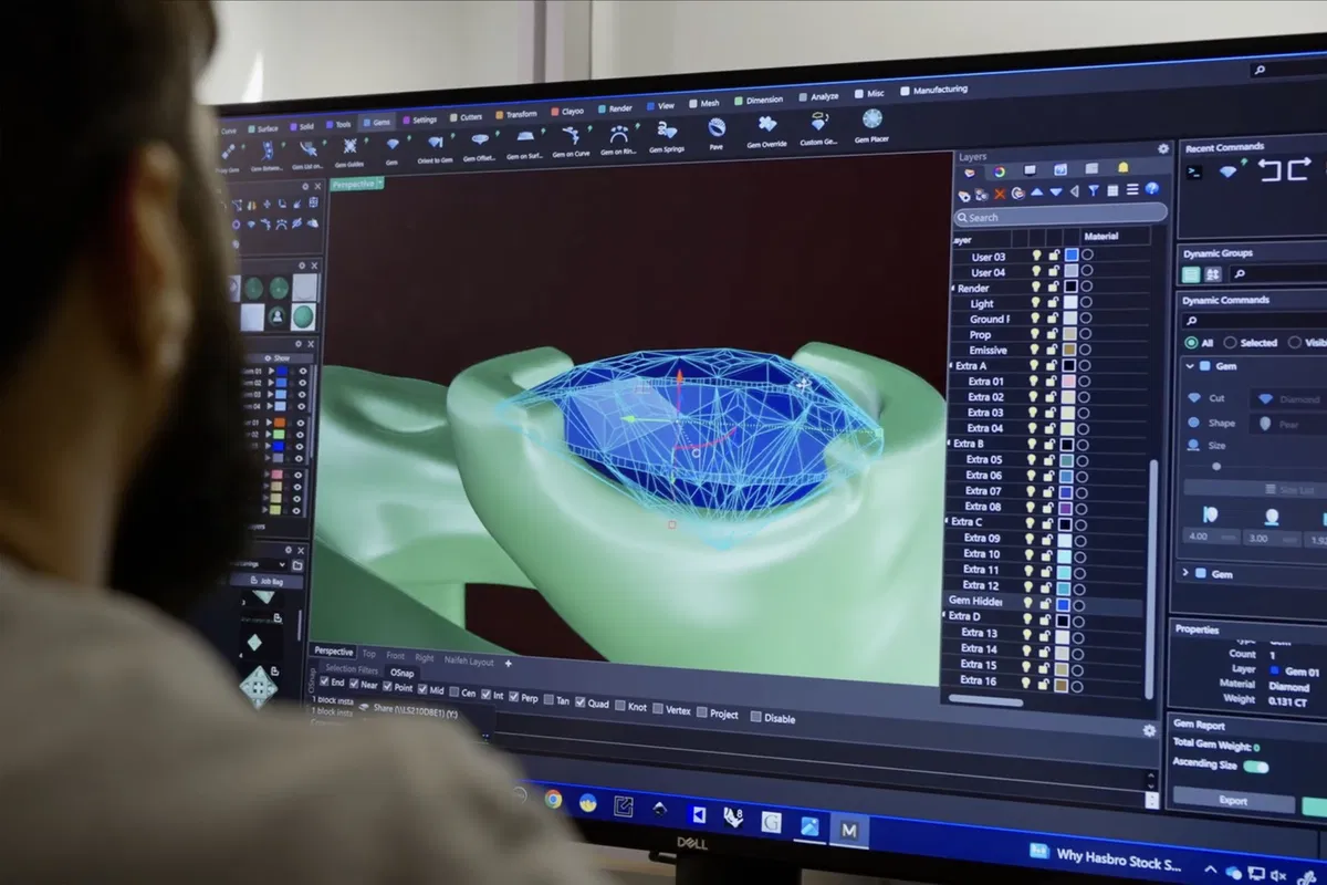 CAD rendering and 3D-printed wax mold of a custom ring design