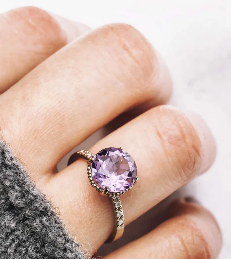 Appraisal expert evaluating fine jewelry at Naifeh Fine Jewelry