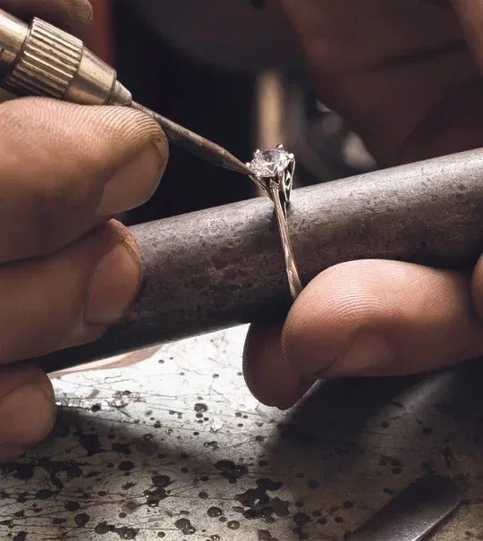Jeweler repairing a piece of fine jewelry