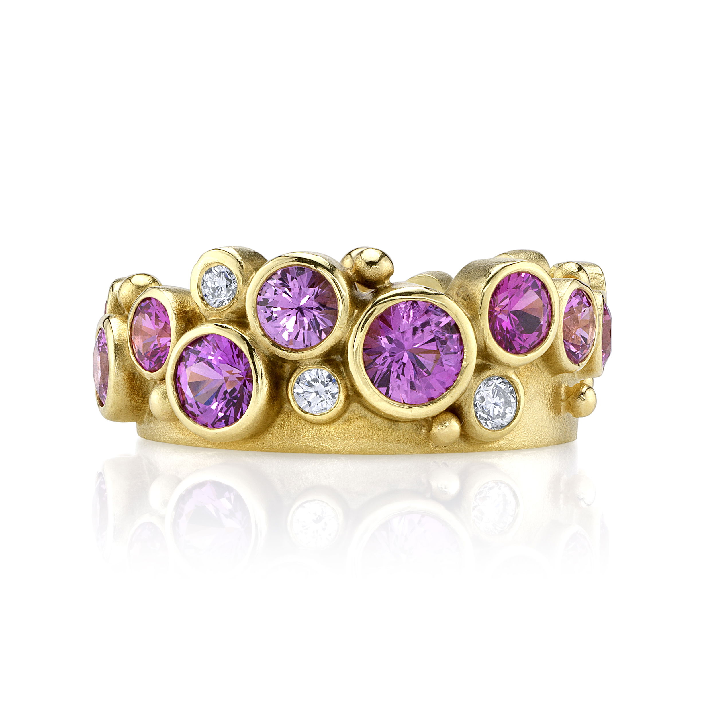 Feel pretty in pink with this darling pink sapphire ring crafted in 18k yellow gold and 10 round diamonds. It’s the perfect accessory to brighten up your look and turn heads wherever you go!-18k Yellow gold-Pink sapphires, 0.26cts-Round Diamonds, 0.26ctsItem# 200-00951 Pretty in Pink Ring