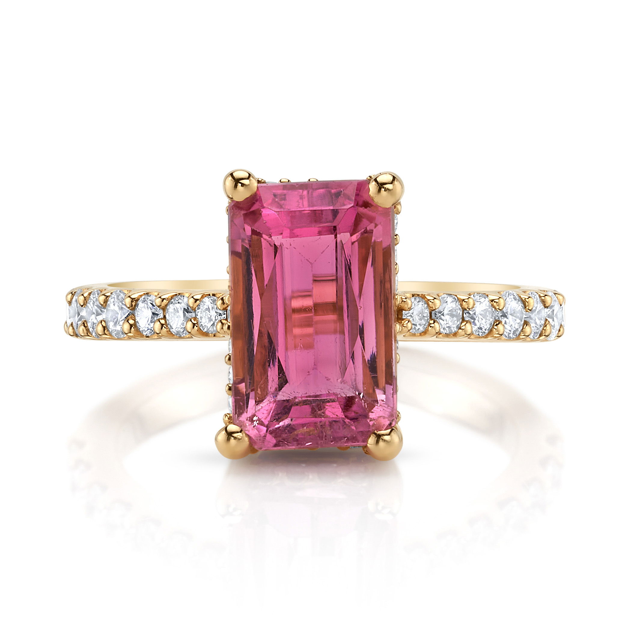 This 18k yellow gold ring showcases a stunning tourmaline accented by brilliant round diamonds. Its classic design adds a touch of luxury to any occasion.-18k Yellow gold-Tourmaline, 3.97ct-Round diamonds, 0.46ctsItem# 200-01159 Pop of Pink Ring