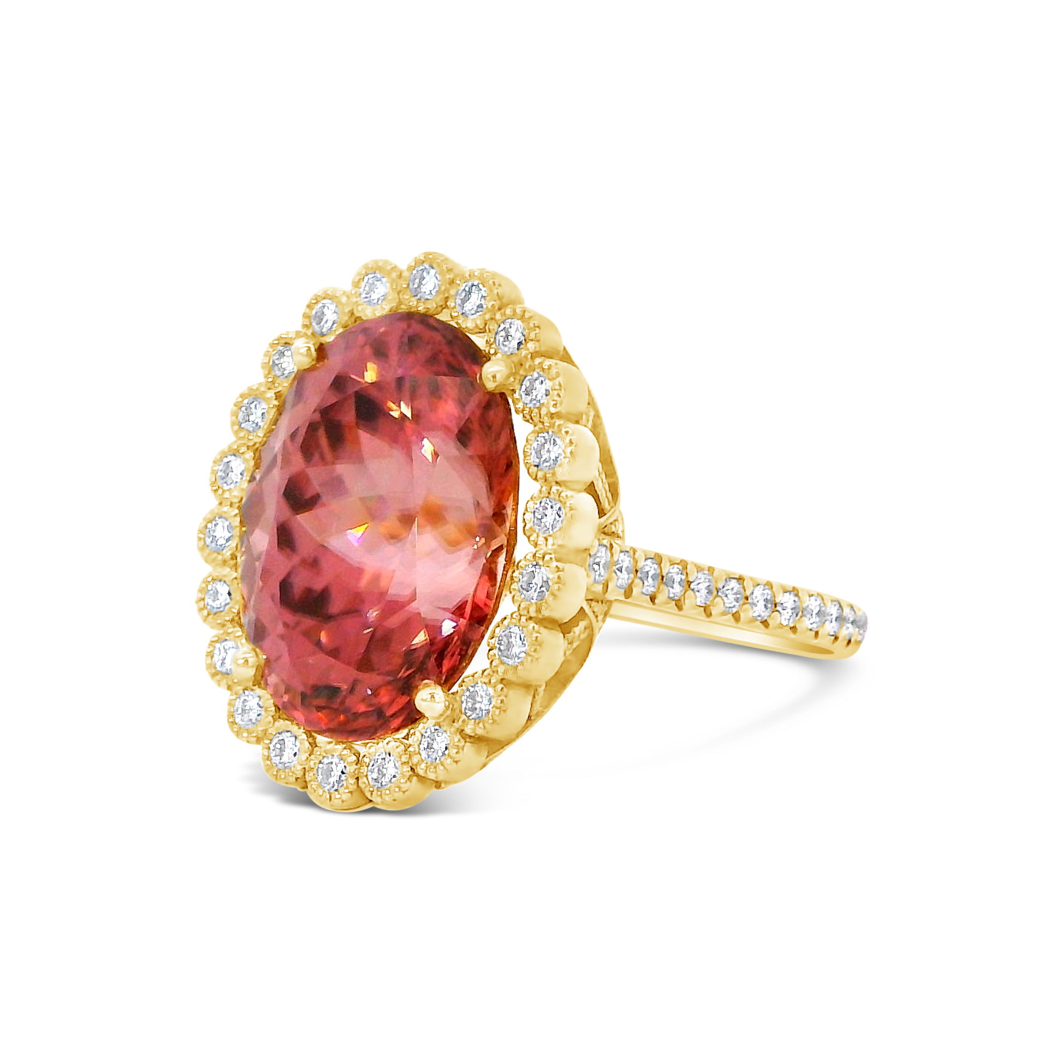 Erica Courtney presents this 18k yellow gold ring featuring a stunning pink zircon accented with round diamonds. Its vibrant color and classic sparkle make it a standout choice for any jewelry collection.-18k Yellow gold-Pink zircon, 18.42cts-Round diamonds, 1.37cts-Size 7Item# 001-200-01163 Pink Zircon Ring