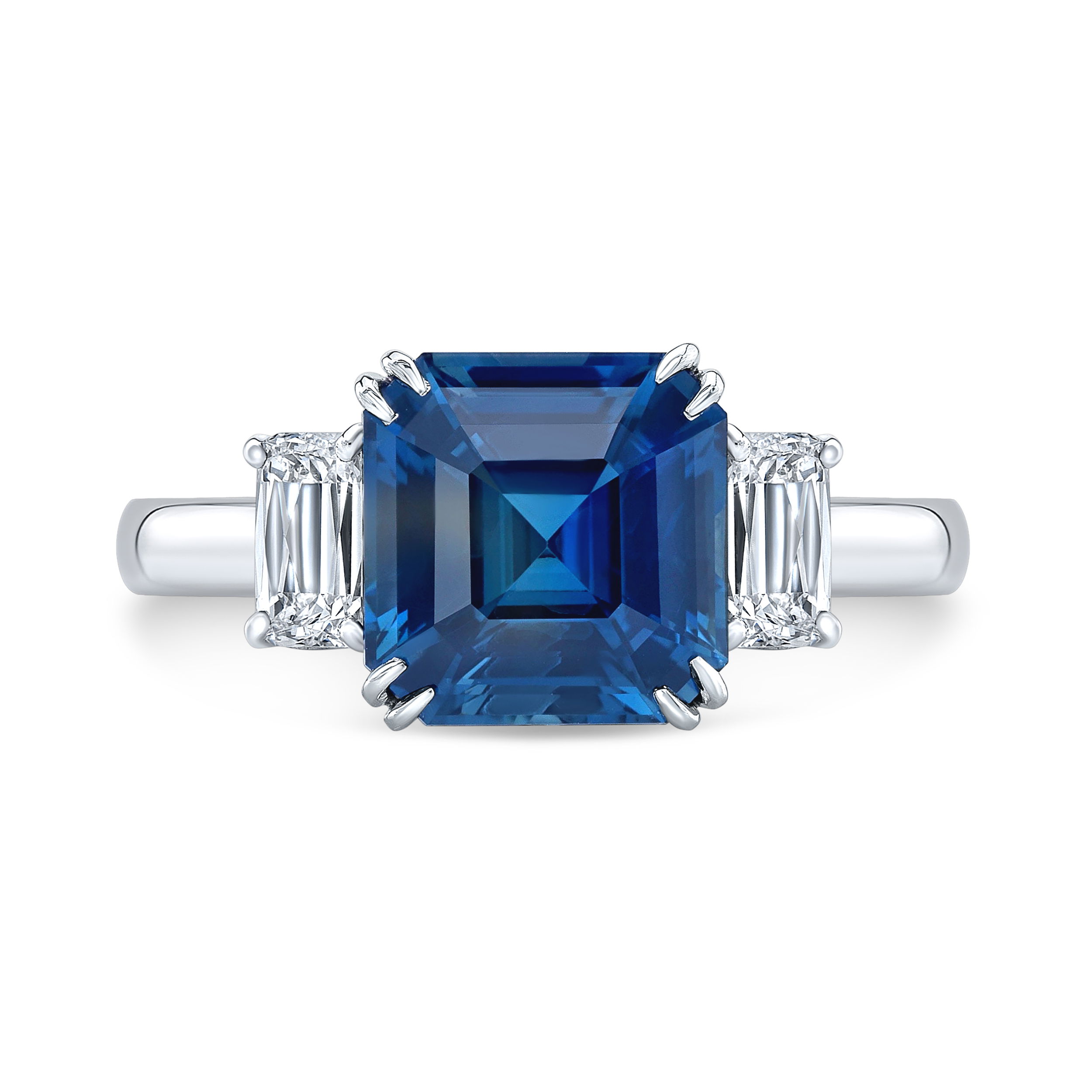 This platinum ring features a gorgeous blue sapphire at its center, framed by sparkling diamonds. It’s a piece that feels both classic and unforgettable, perfect for adding a touch of elegance to any look.-Platinum-Blue Sapphire, 5.65ct-Ashoka and square diamonds, 1.00cts-Size 7.5Item# 001-200-01209 Platinum Blue Sapphire Ring