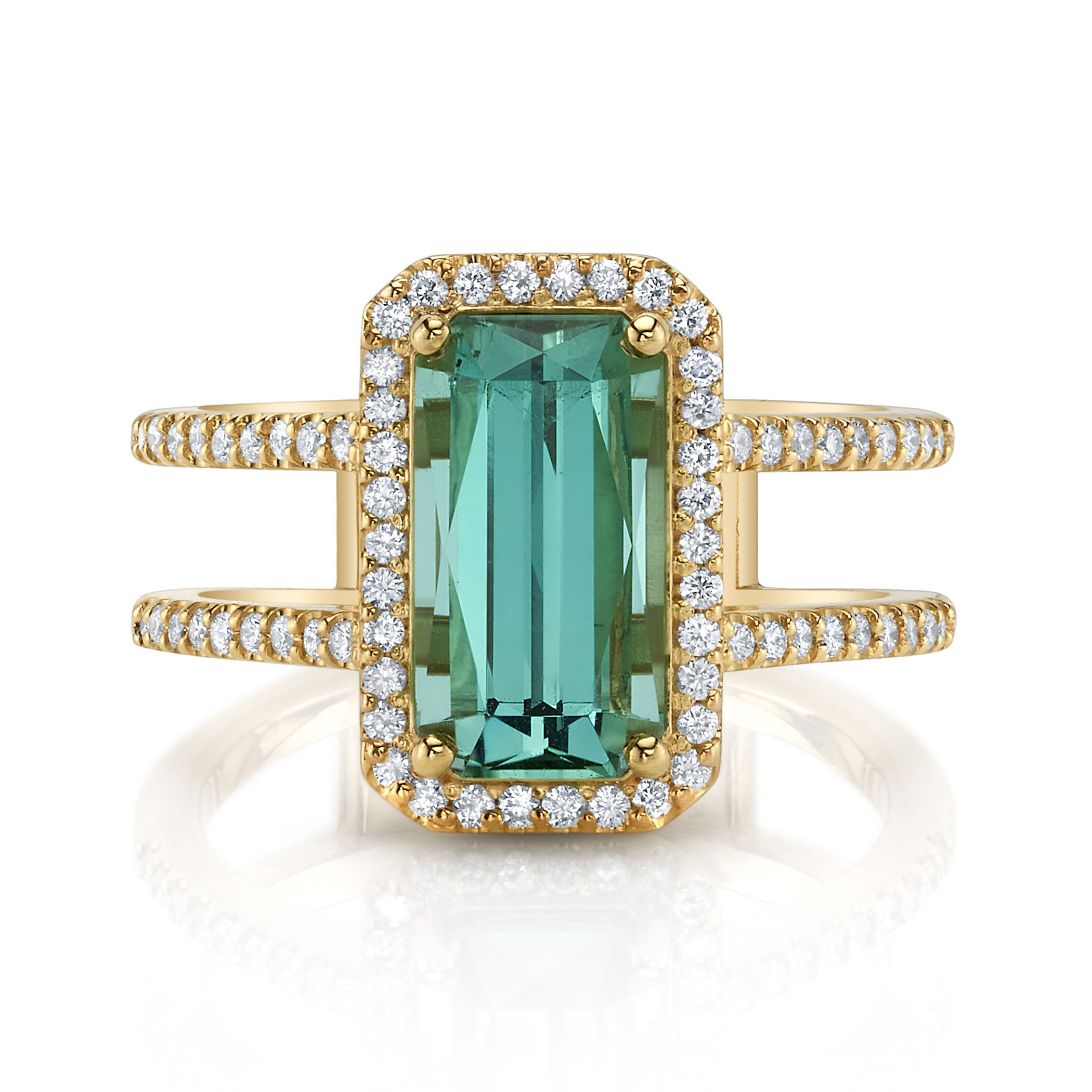 This 18k yellow gold ring features a striking rectangular tourmaline, enhanced by sparkling round diamonds for a touch of elegance. Its bold design and vibrant gemstone make it a beautiful statement piece. With love, Valerie!-18k Yellow gold-Rectangular tourmaline, 2.90cts-Round diamonds, 0.35cts-Size 7. Contact for sizing options.Item# 200-01217 With Love Ring