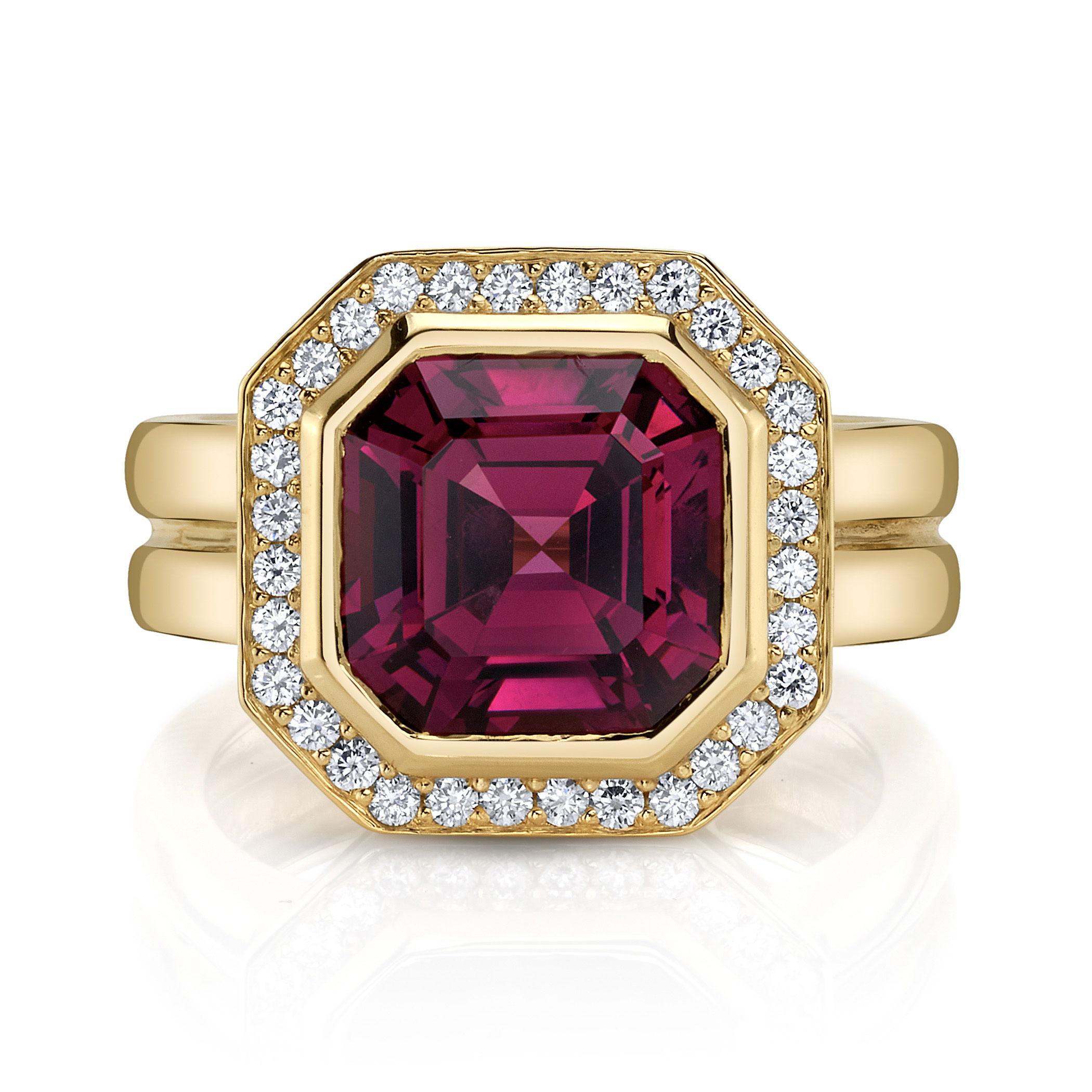 This vibrant umbalite garnet, surrounded by dazzling round diamonds and set in 18k yellow gold, is sure to become your new muse. Let this captivating piece inspire your style and add a touch of brilliance to your every day!-18k Yellow gold-Umbalite garnet, 5.95cts-Round diamonds, 0.32ctsItem# 200-01218 Muse Ring