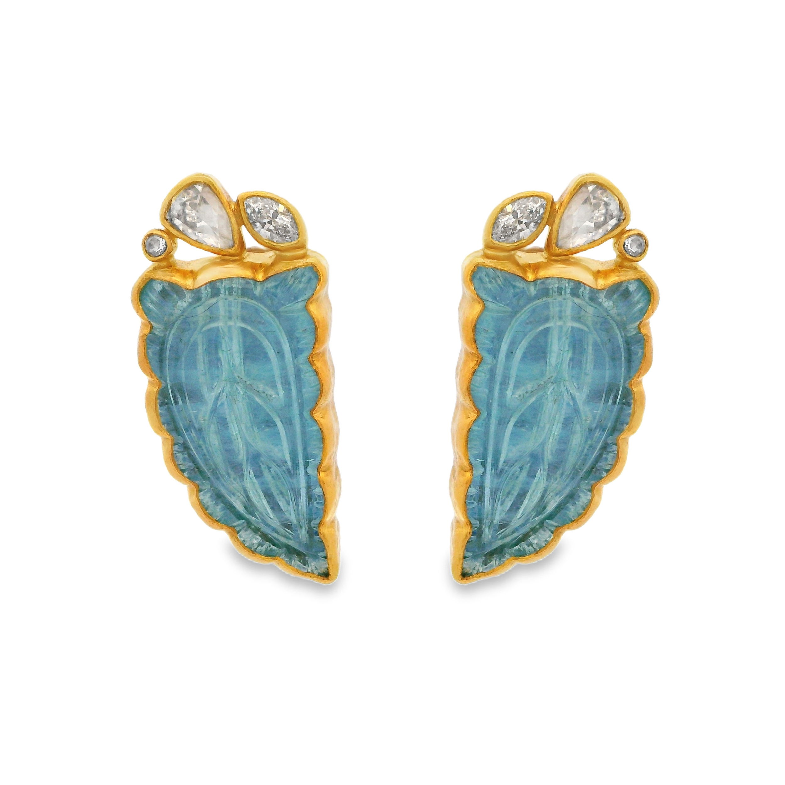 These aquamarine earrings, set in 24k yellow gold and accented with diamonds, bring a refreshing touch of elegance to any outfit. Their unique shape adds a playful twist, perfect for both everyday wear and special occasions.-24k Yellow gold-Aquamarine, 30.44cts-Rose cut diamonds, 1.50ctsItem# 001-210-01556 Carved Aquamarine Earrings