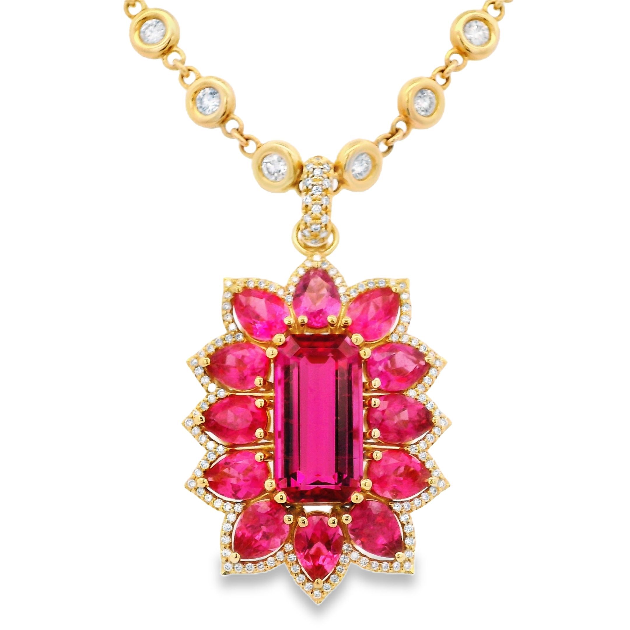 Erica Courtney presents this 18k yellow gold pendant featuring a rich rubellite tourmaline, elegantly paired with pear-shaped tourmalines and sparkling diamonds. Bold and luxurious, it adds a vibrant touch of color and sparkle to any collection.-18k Yellow gold-Rubellite tourmaline, 8.65cts-Pear shaped tourmalines, 8.56cts-Diamonds, 0.59ctsItem# 001-230-00381 Valerie Pendant