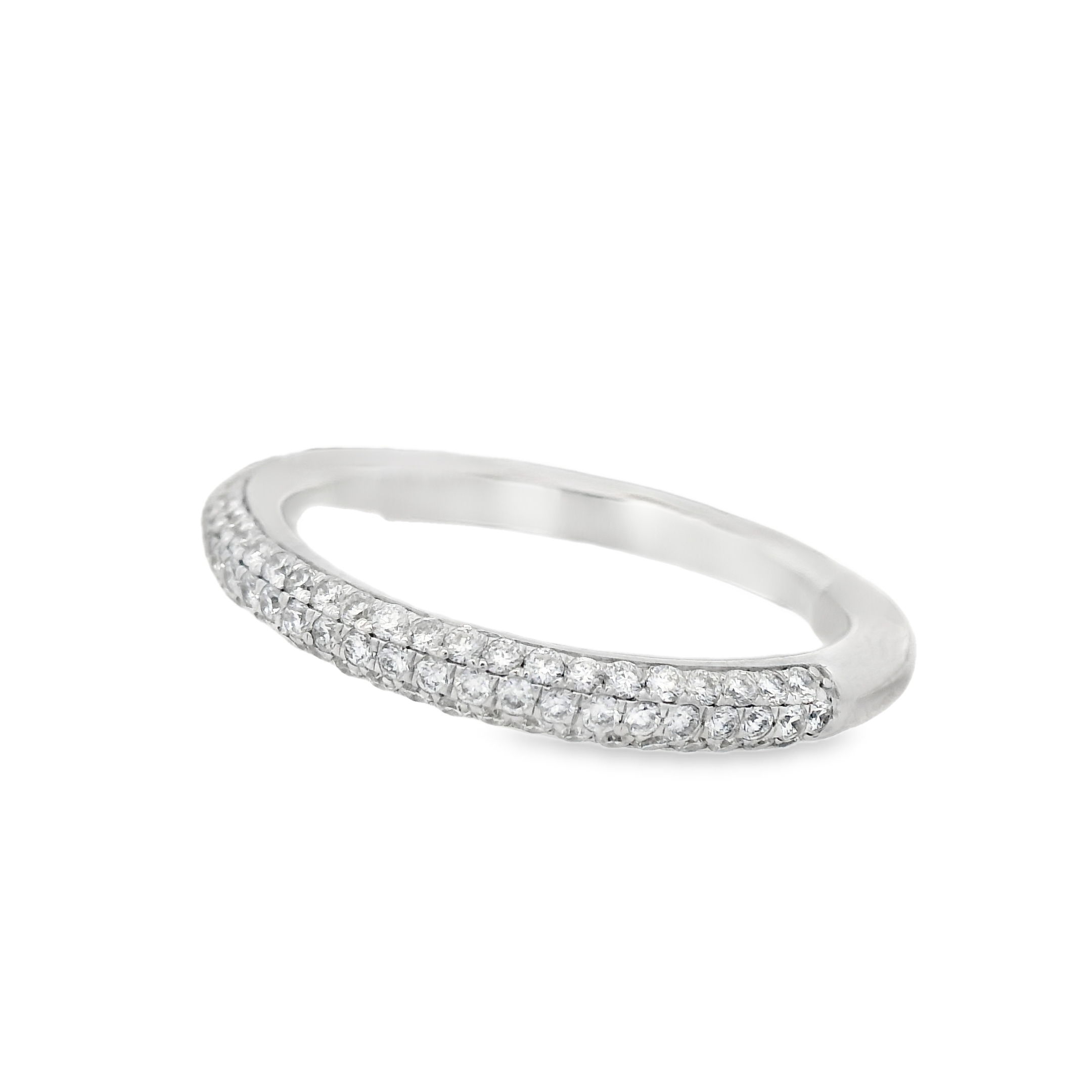 Classic and timeless, this 18k white gold pavé set diamond wedding band sparkles with brilliance. The meticulously set diamonds create a seamless shimmer, making it perfect for wearing alongside an engagement ring.-18k White gold-Round diamonds, 0.50cts-Size 6.5, Contact for sizing optionsItem# 110-00591 Pave Wedding Band