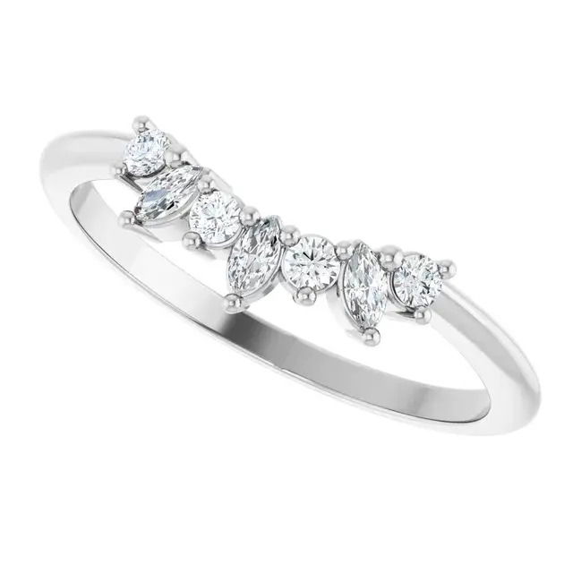 Elegantly curved to complement your engagement ring, this 18K white gold contour band features alternating round and marquise diamonds. A graceful design that adds brilliance and a touch of vintage charm.-18k White gold-Round, Marquise diamonds, 0.16cts-Size 6.5, Contact for sizing optionsItem# 110-00597 Contour Wedding Band