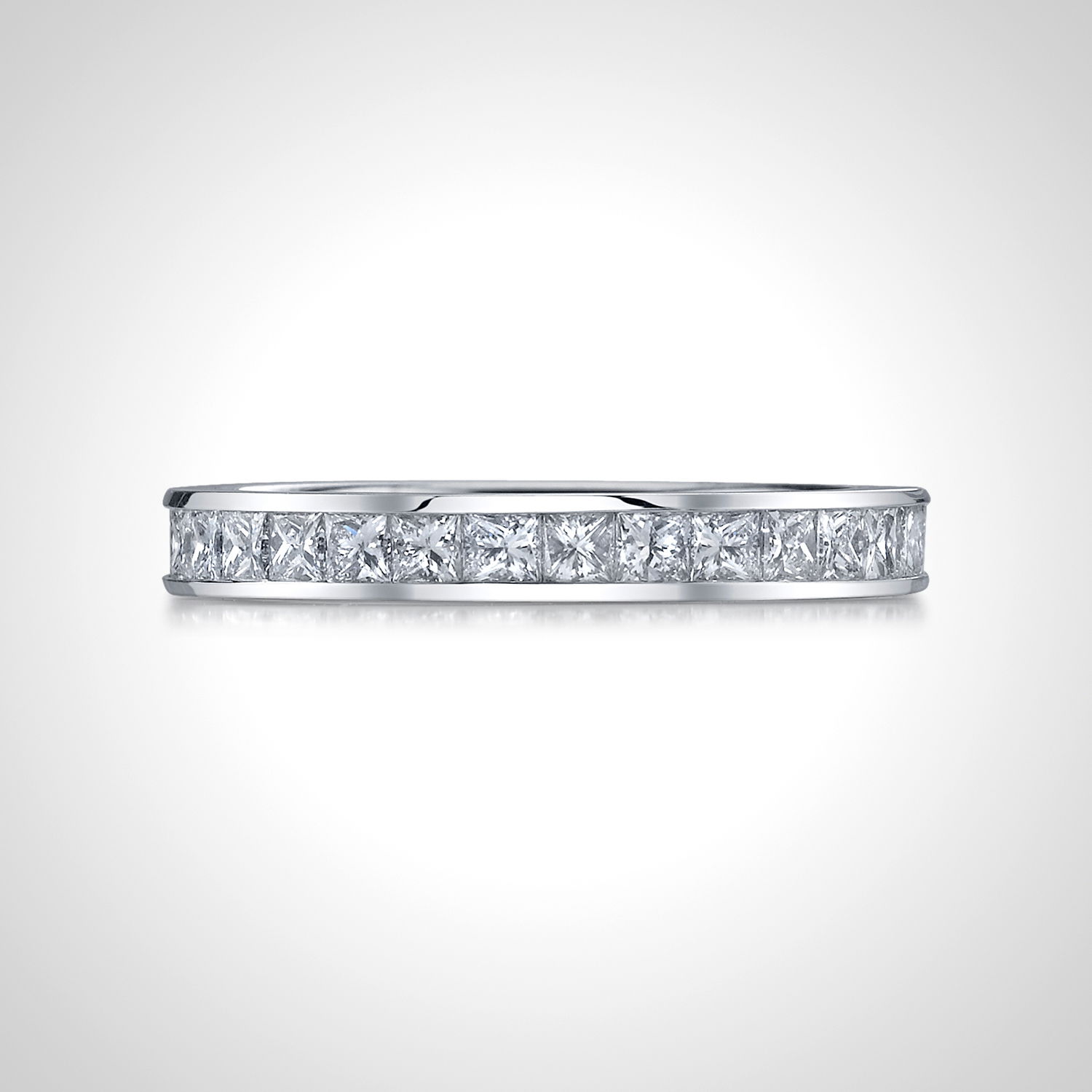 This platinum eternity band showcases channel-set princess cut diamonds, creating a clean and modern design with exceptional brilliance. A perfect symbol of everlasting love, this timeless piece adds a sophisticated touch to any jewelry collection.-Platinum-Princess cut Diamonds, 1.50cts-Size 5.75, Contact for sizing optionsItem #: 120-00120 Princess Cut Eternity Band