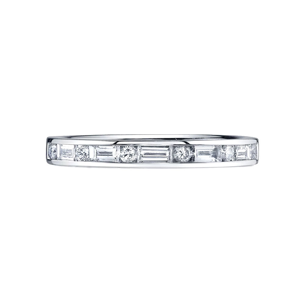 This 1/2-way band features alternating channel-set baguette and round diamonds, creating a balanced and sophisticated design. Its timeless elegance makes it a perfect choice for any occasion, offering a stunning blend of sparkle and style.-18k White gold-Round and baguette diamonds, 0.84cts-Size 6.5, Contact for sizing optionsItem# 120-00121 Baguette & Round Wedding Band